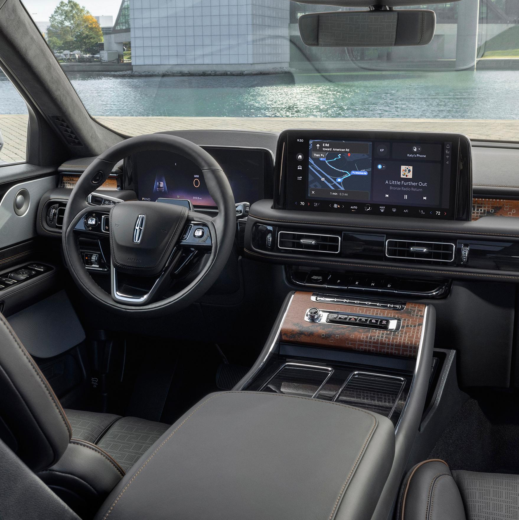 The front cabin of a 2027 Lincoln Black Label Aviator® SUV is shown in the Invitation interior theme