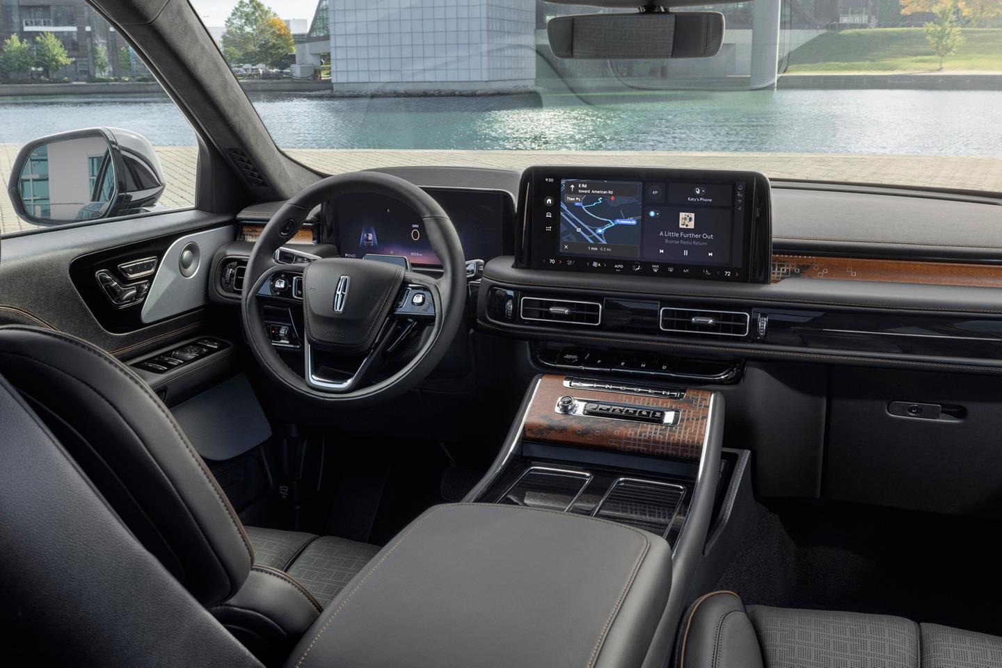 The front cabin of a 2025 Lincoln Black Label Nautilus® SUV is shown in the Invitation interior theme