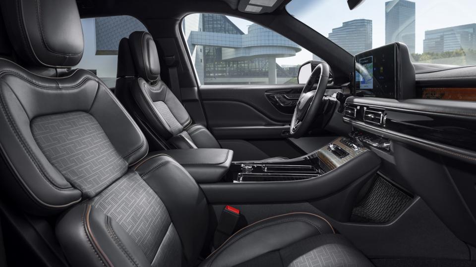 Rich leather details and other fine materials comprise the Lincoln Black Label Invitation interior theme