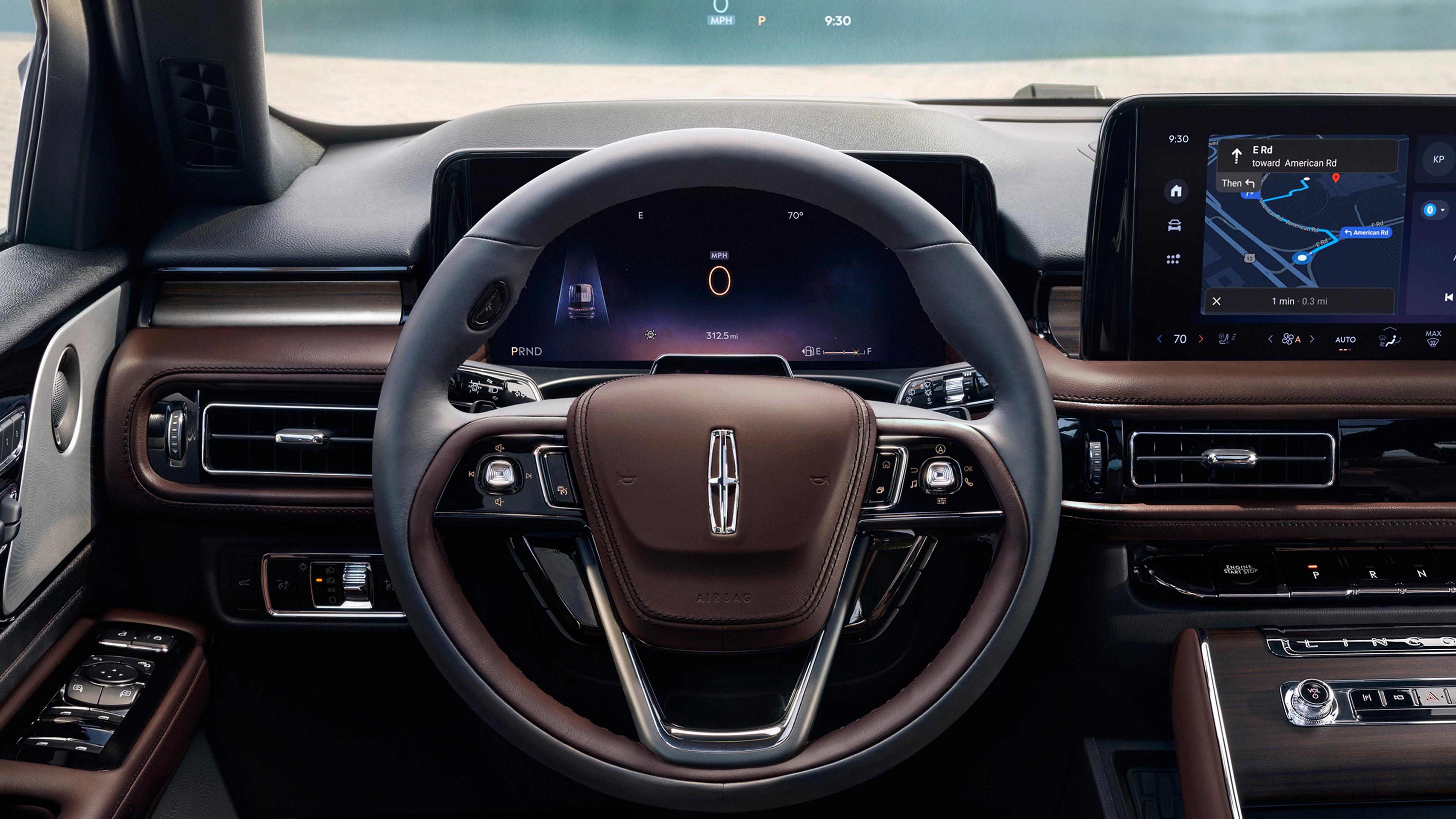 The driver's information cluster behind the steering wheel of a 2027 Lincoln Aviator® SUV