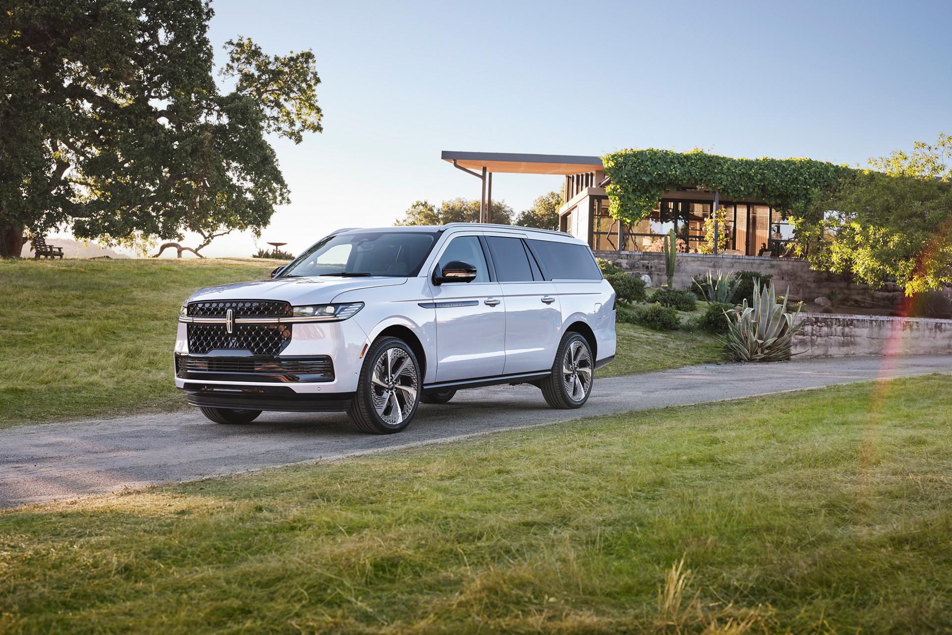 The Lincoln Navigator parked on a road outside a scenic area.