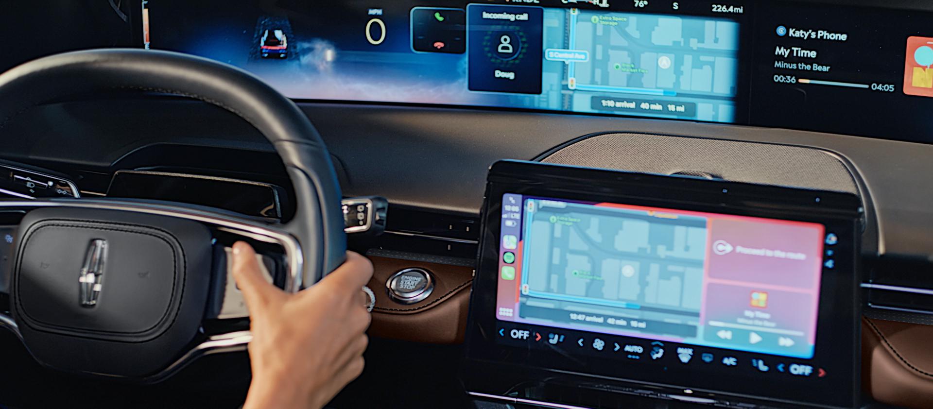 The driver of a 2026 Lincoln Nautilus® SUV uses the Advanced steering wheel controls
