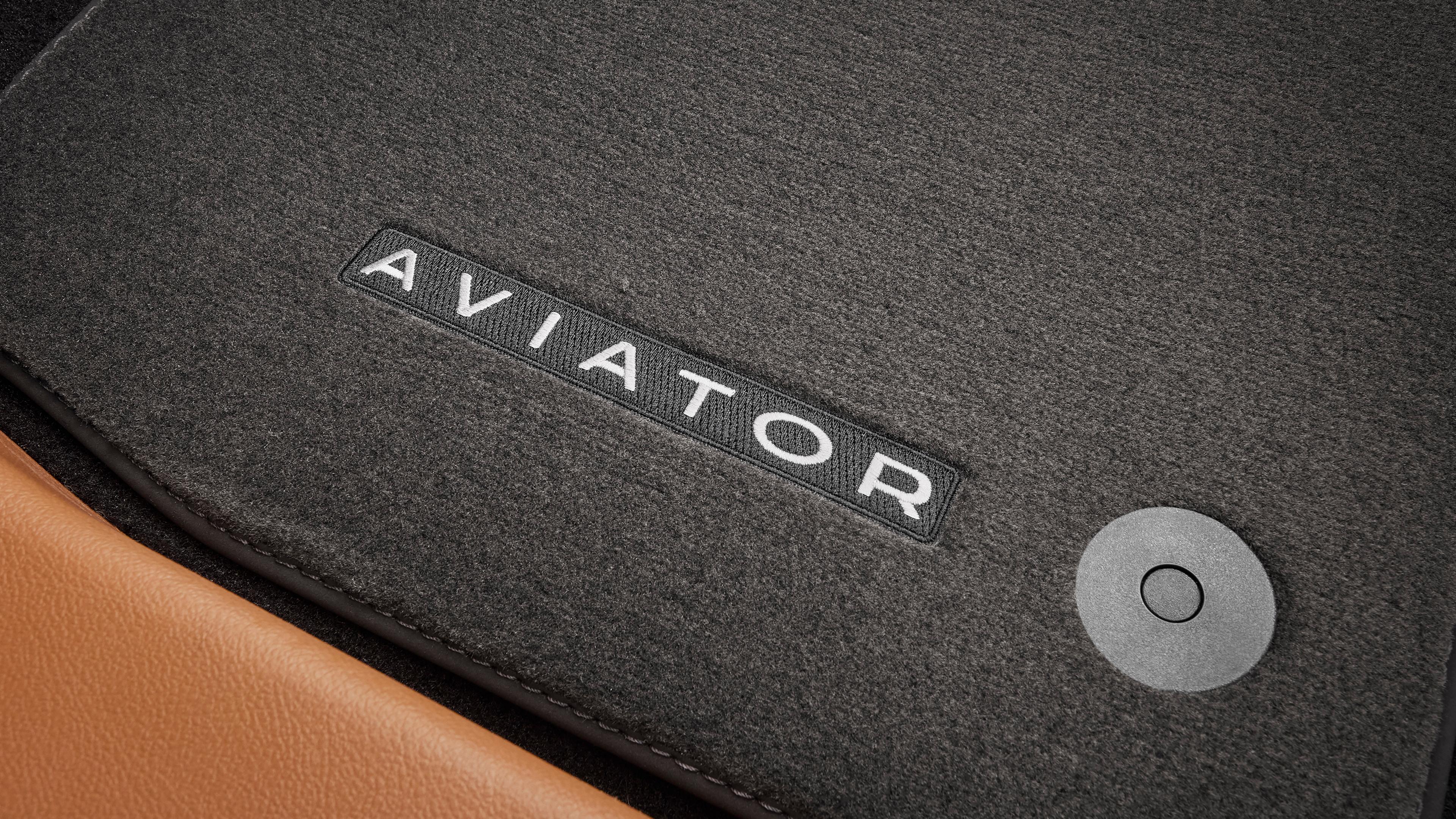 Interior of the 2026 Lincoln Aviator with carpet floor mats