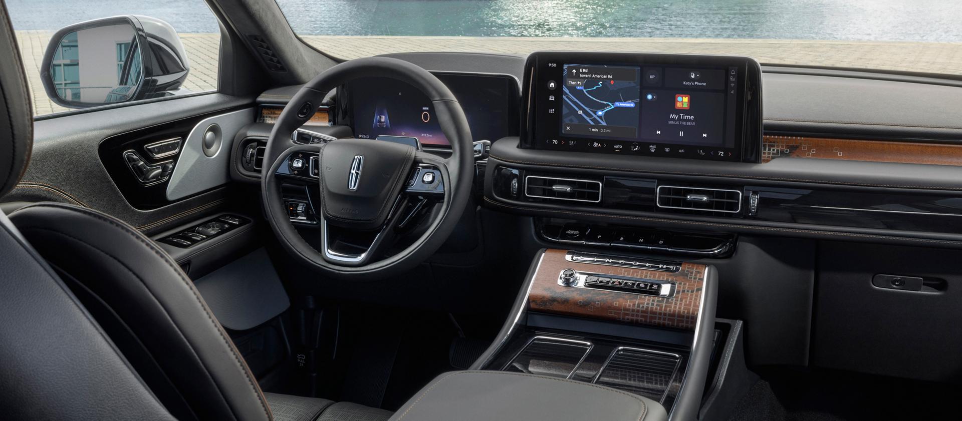 The front cabin of a 2025 Lincoln Black Label Nautilus® SUV is shown in the Invitation interior theme