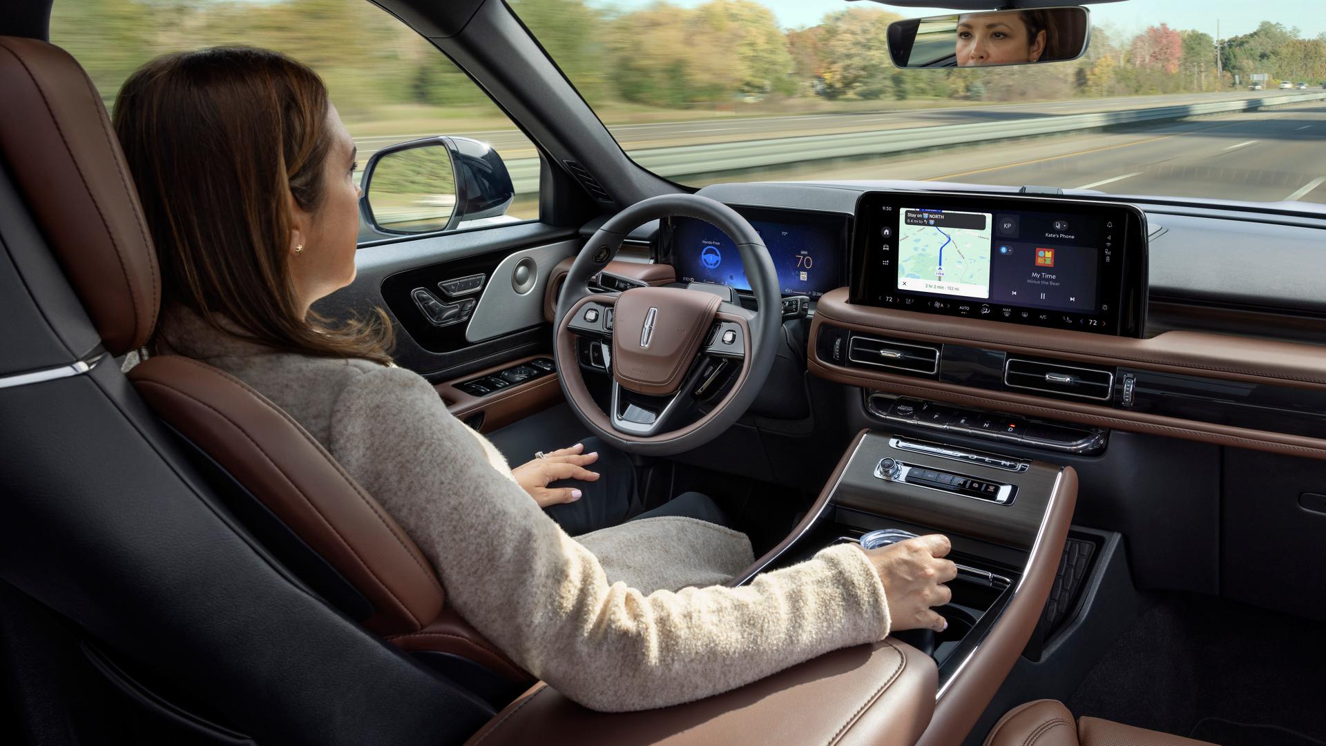 A 2026 Lincoln Aviator® SUV is being driven hands-free on a highway