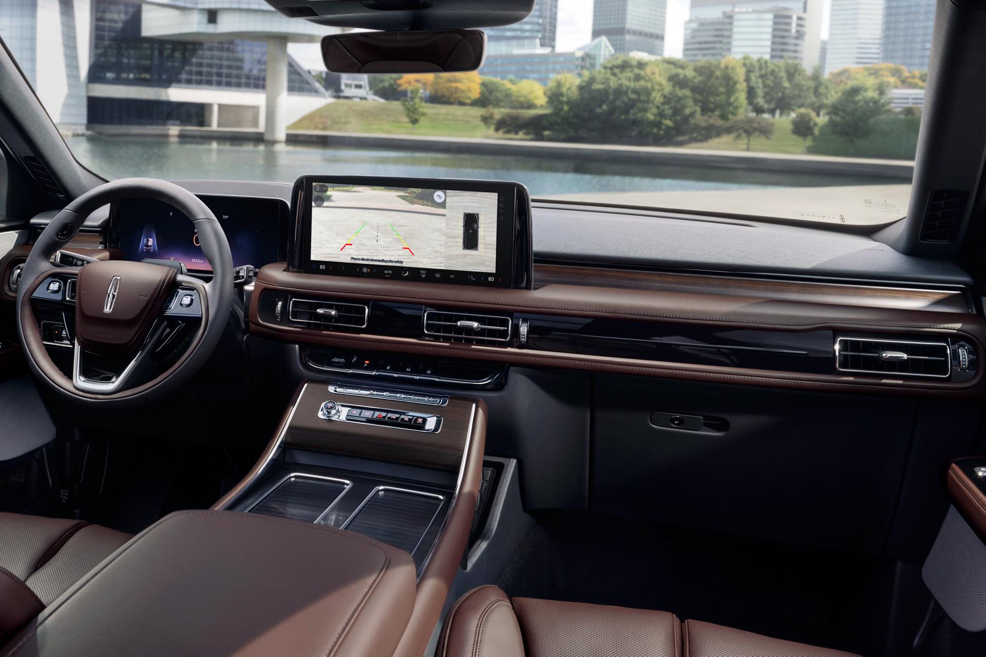 The center touchscreen inside a 2025 Lincoln Aviator® SUV displays the rear camera view.