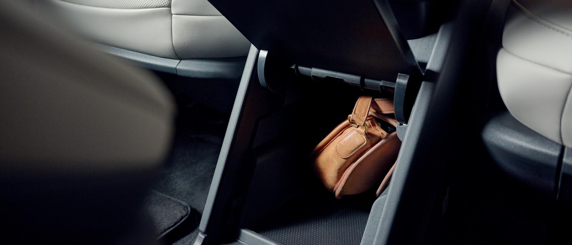 The second-row console provides convenient storage to safely stow small personal items