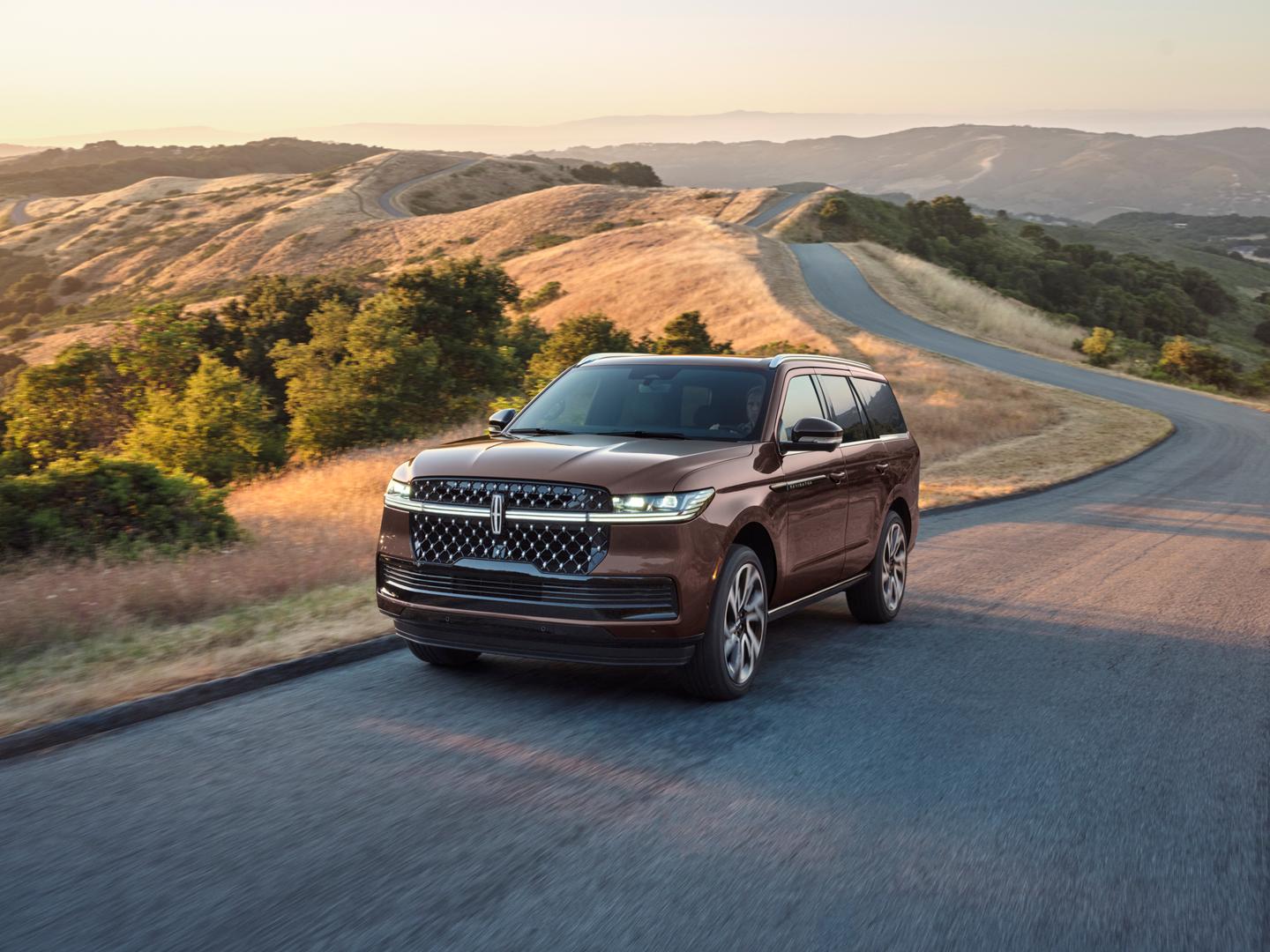 The 2027 Lincoln Navigator driving down the road