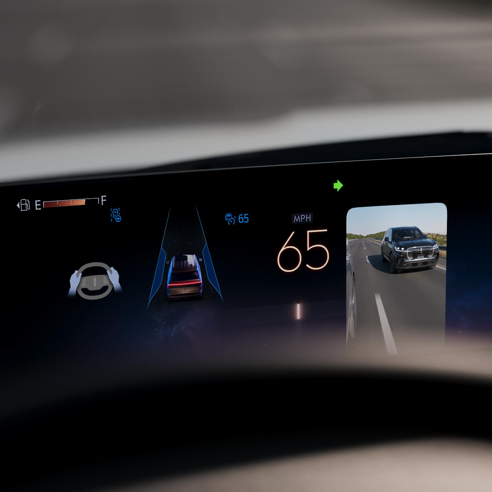 The panoramic display of the 2027 Lincoln Navigator® SUV shows the side camera that enables Turn Signal View