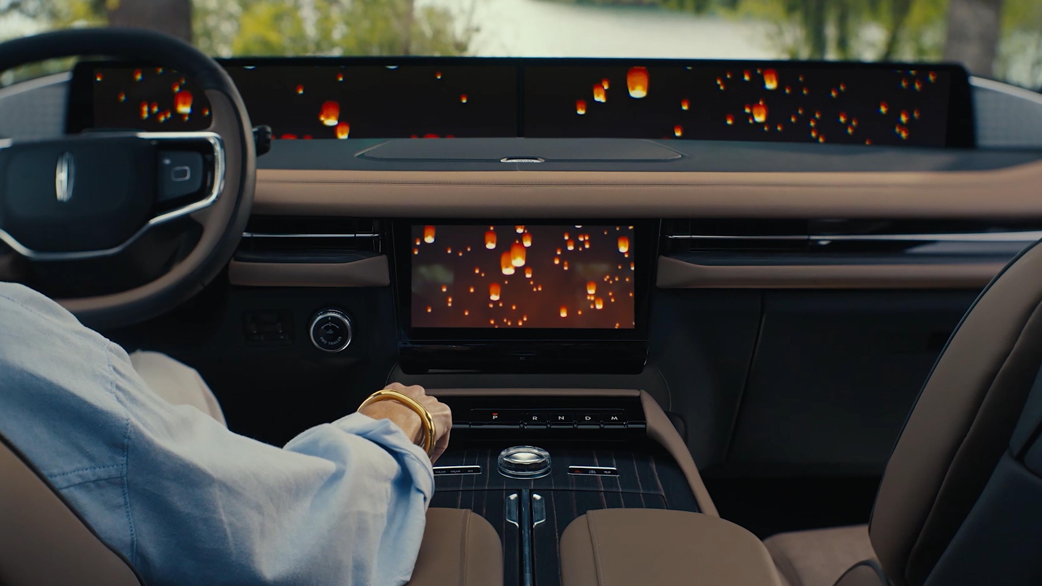 The driver of a parked 2027 Lincoln Navigator® SUV enjoys Lincoln Rejuvenate