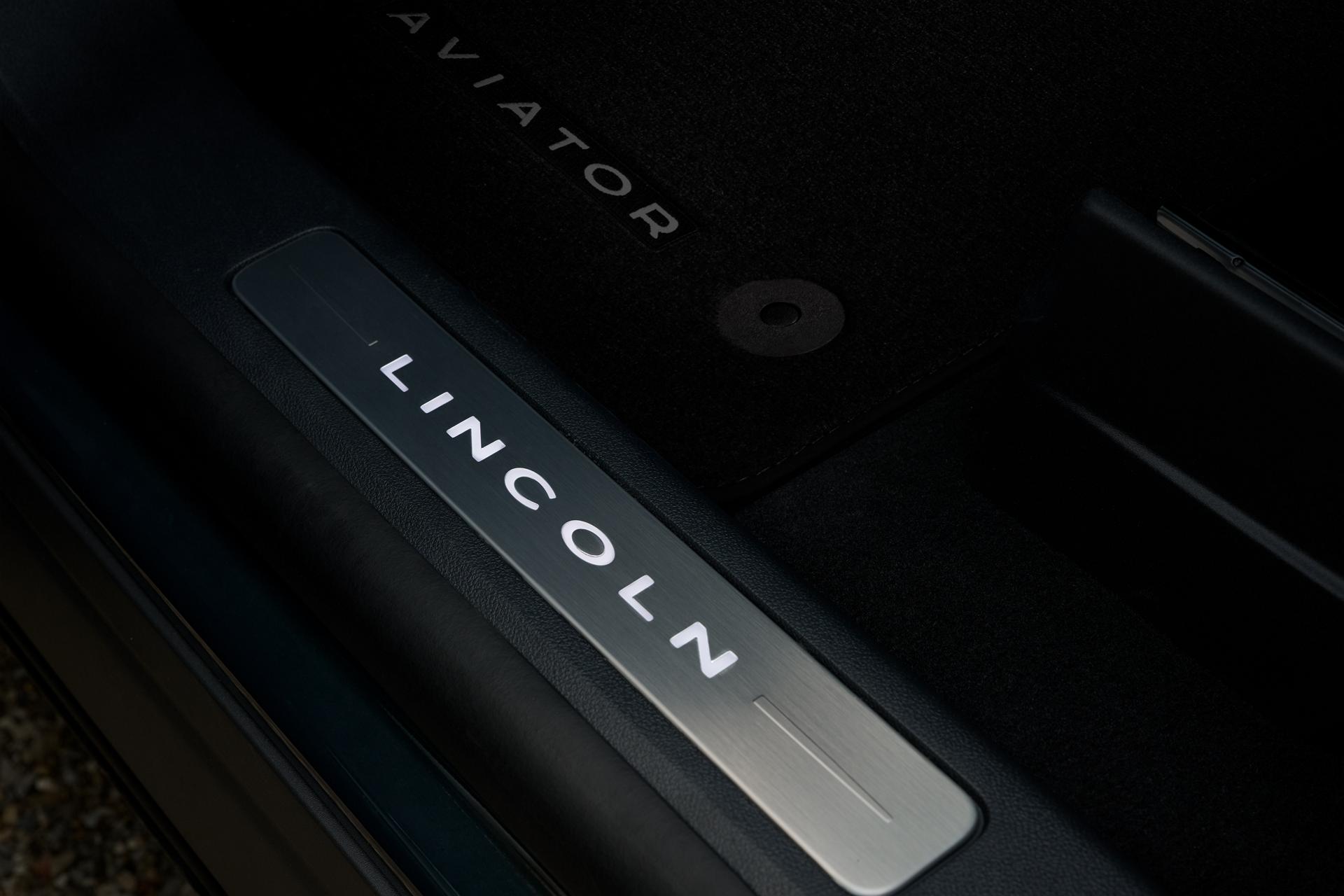 Lettering spells Lincoln on the aluminum door sill scuff plate