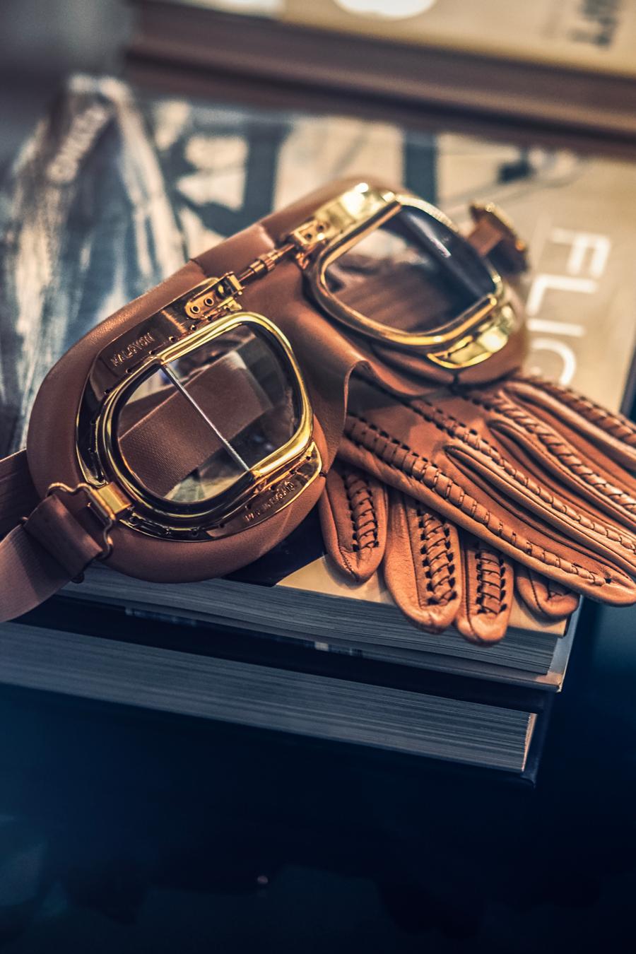 Aviation goggles and gloves hint suggest inspiration of the Lincoln Black Label Flight theme