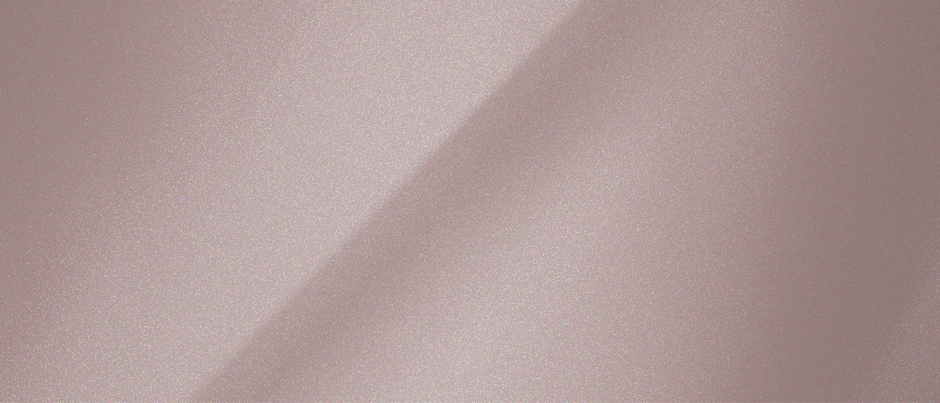 A color chip representing the extra-cost Tinted Copper Metallic Clearcoat exterior color