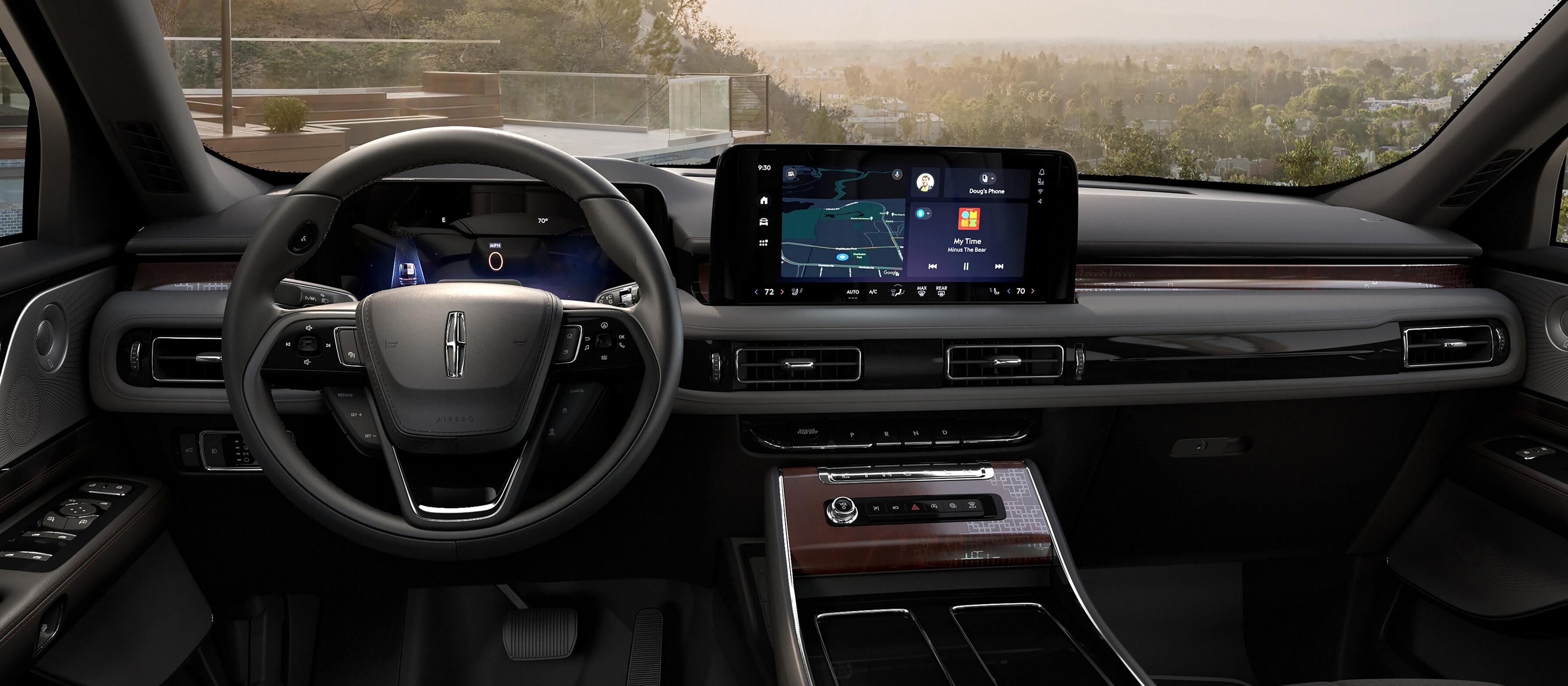 The interior of a 2026 Lincoln Black Label™ Aviator® SUV from the second row looking through the windshield
