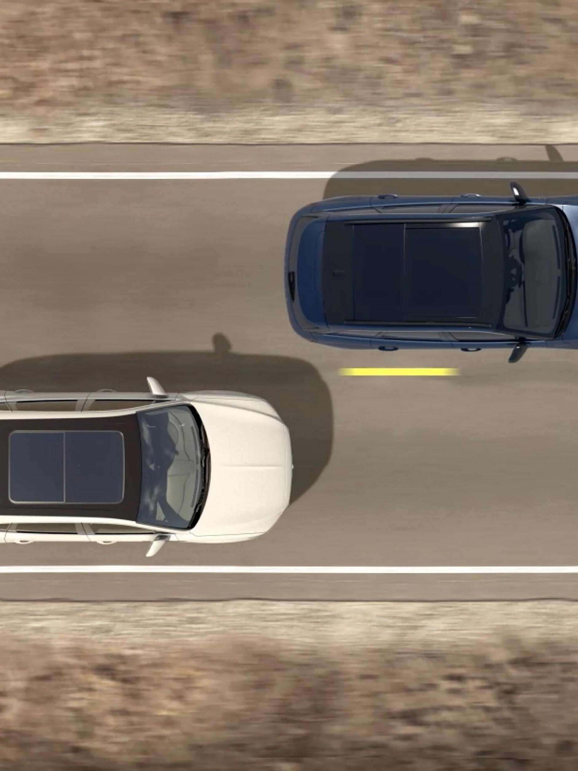 Se muestra un SUV 2026 Lincoln Aviator® pasando a otro vehículo desde arriba