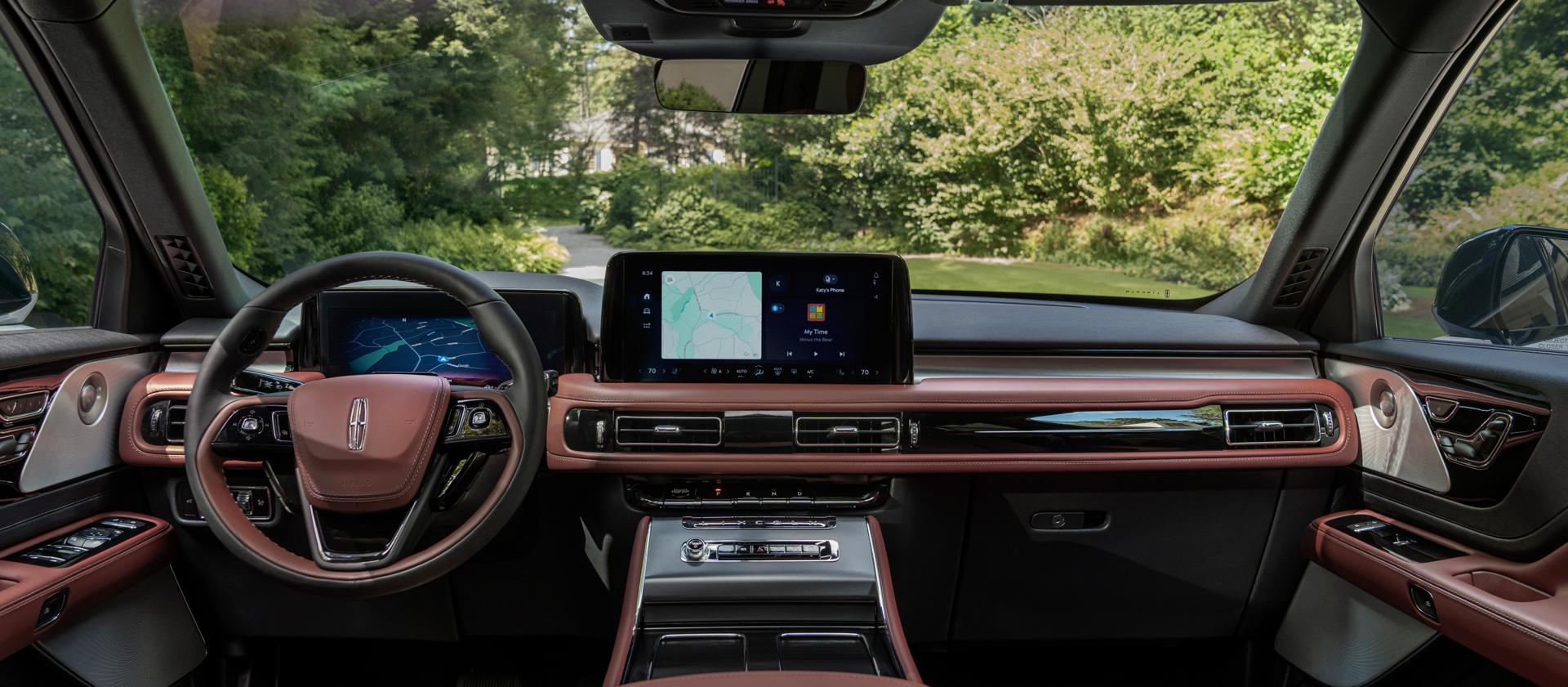 The interior of a 2026 Lincoln Aviator® SUV with the The panoramic Vista Roof