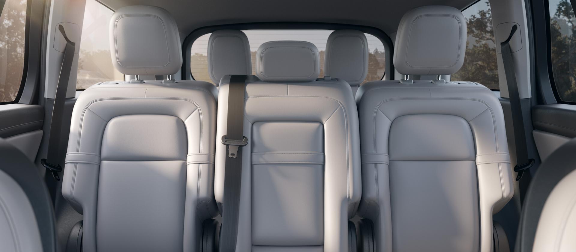 The second row of a 2026 Lincoln Aviator® SUV is shown with comfortable seating for three
