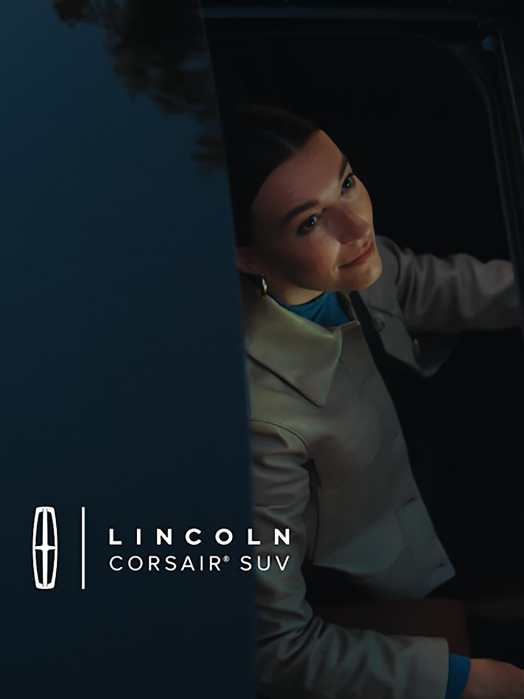 Video of a woman sitting in a 2025 Lincoln Corsair® opening the Panoramic Vista Roof®