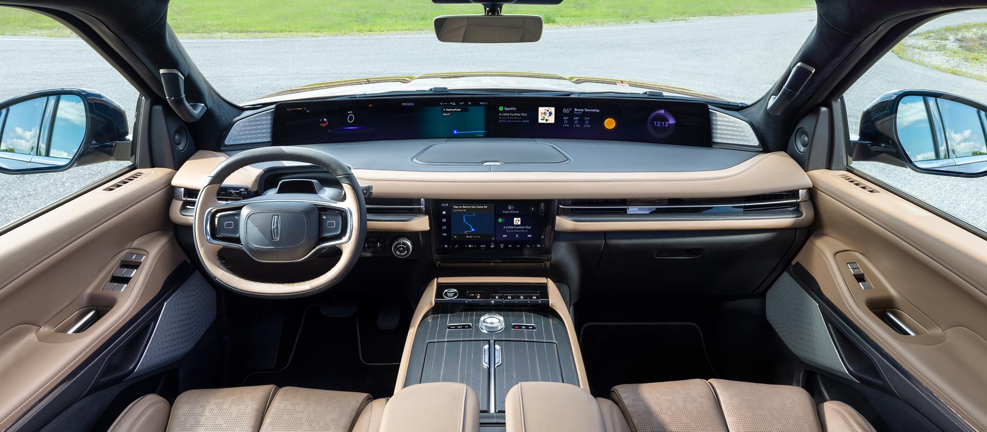 The interior of a 2026 Lincoln Navigator® Black Label™ SUV plays host to a dramatic panoramic display