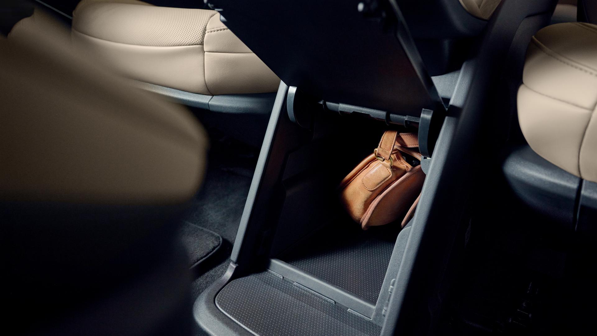 The second-row console provides convenient storage to safely stow small personal items