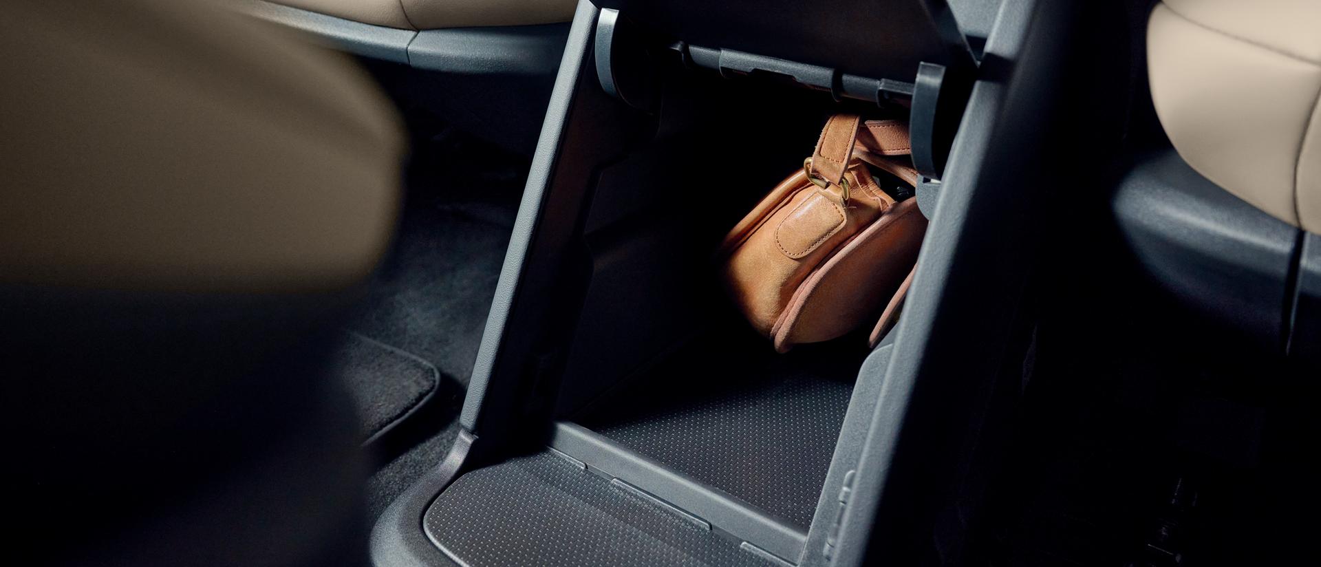 The second-row console provides convenient storage to safely stow small personal items