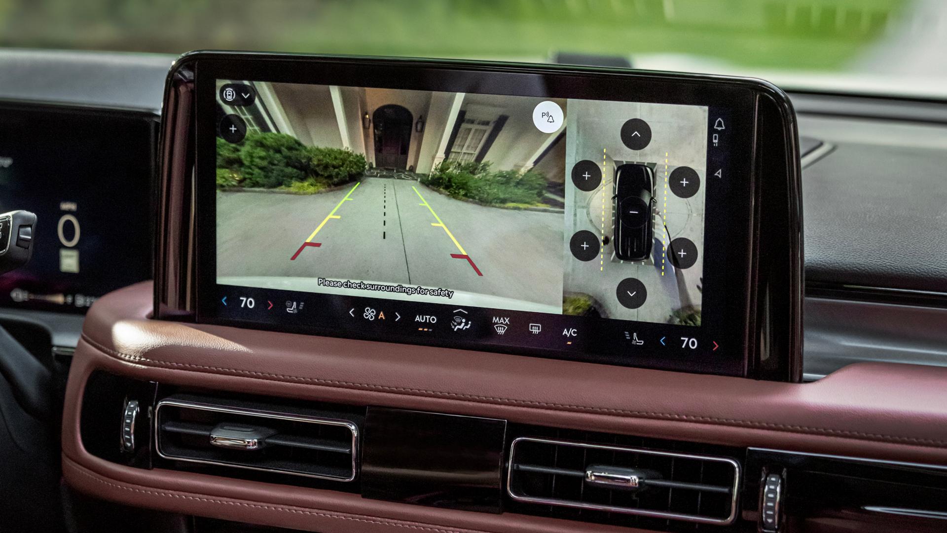 An overhead view of a A 2027 Lincoln Aviator® SUV is displayed in the center touchscreen