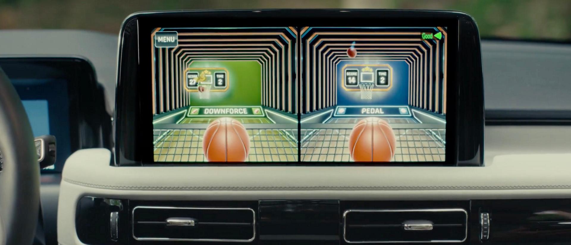 Children enjoy in-vehicle gaming from the second row of a parked 2027 Lincoln Aviator® SUV