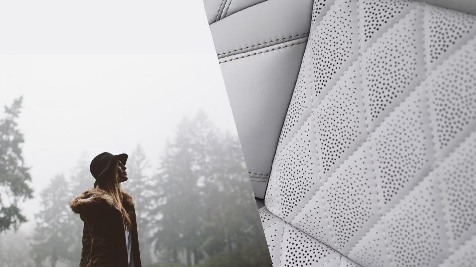 A woman standing in the wilderness and a seat inside the Lincoln Navigator.