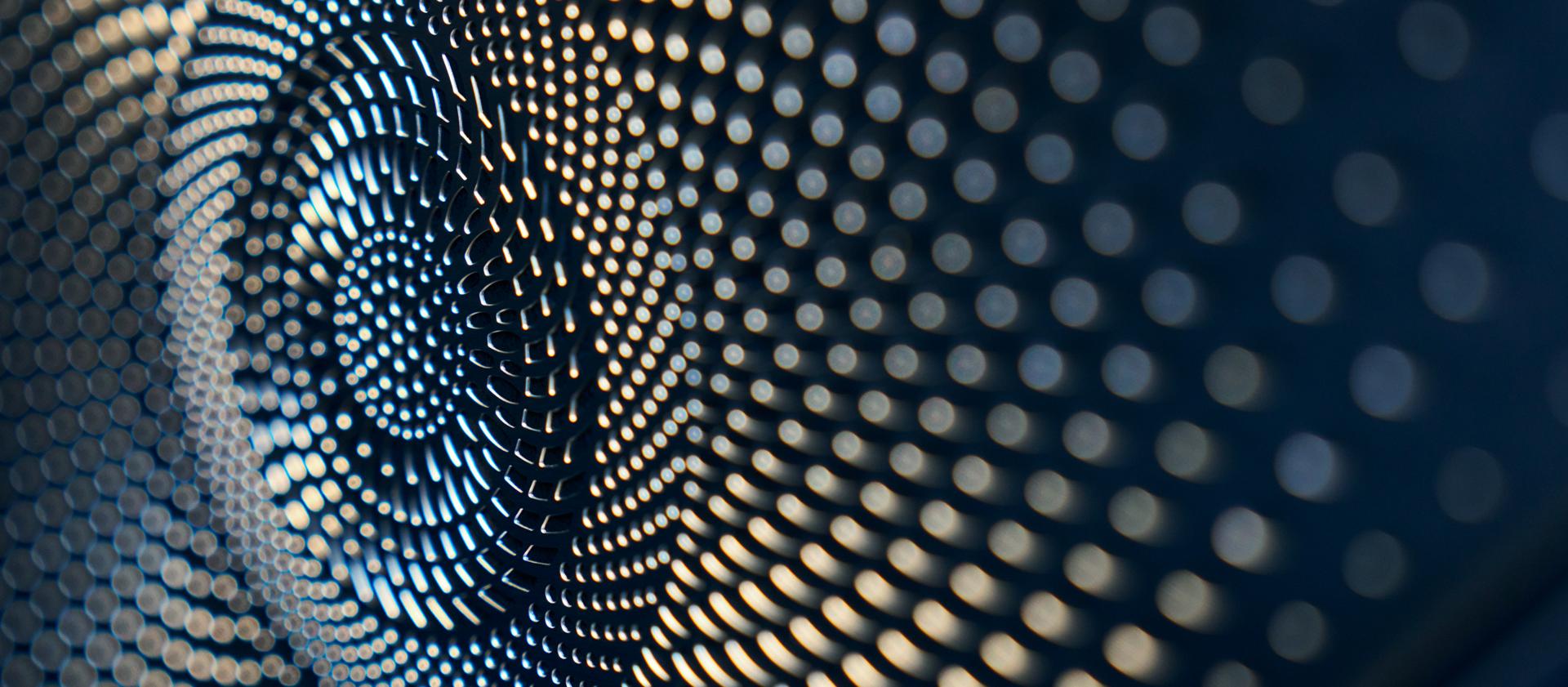 The front door panel of a 2026 Lincoln Nautilus® SUV plays host to multiple audio speakers