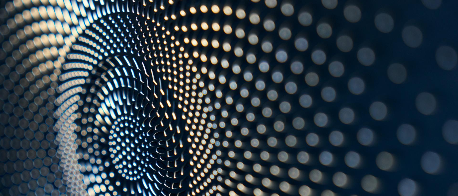 The front door panel of a 2026 Lincoln Nautilus® SUV plays host to multiple audio speakers