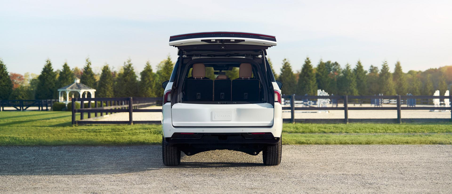 A 2026 Lincoln Navigator® with the Lincoln Split Gate open shows how much can fit in the cargo area
