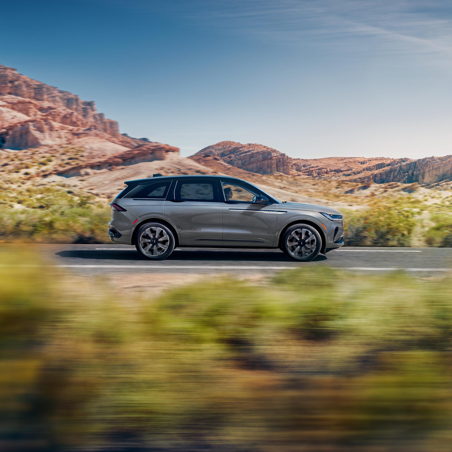 A 2026 Lincoln Nautilus® SUV is being driven on a desert highway