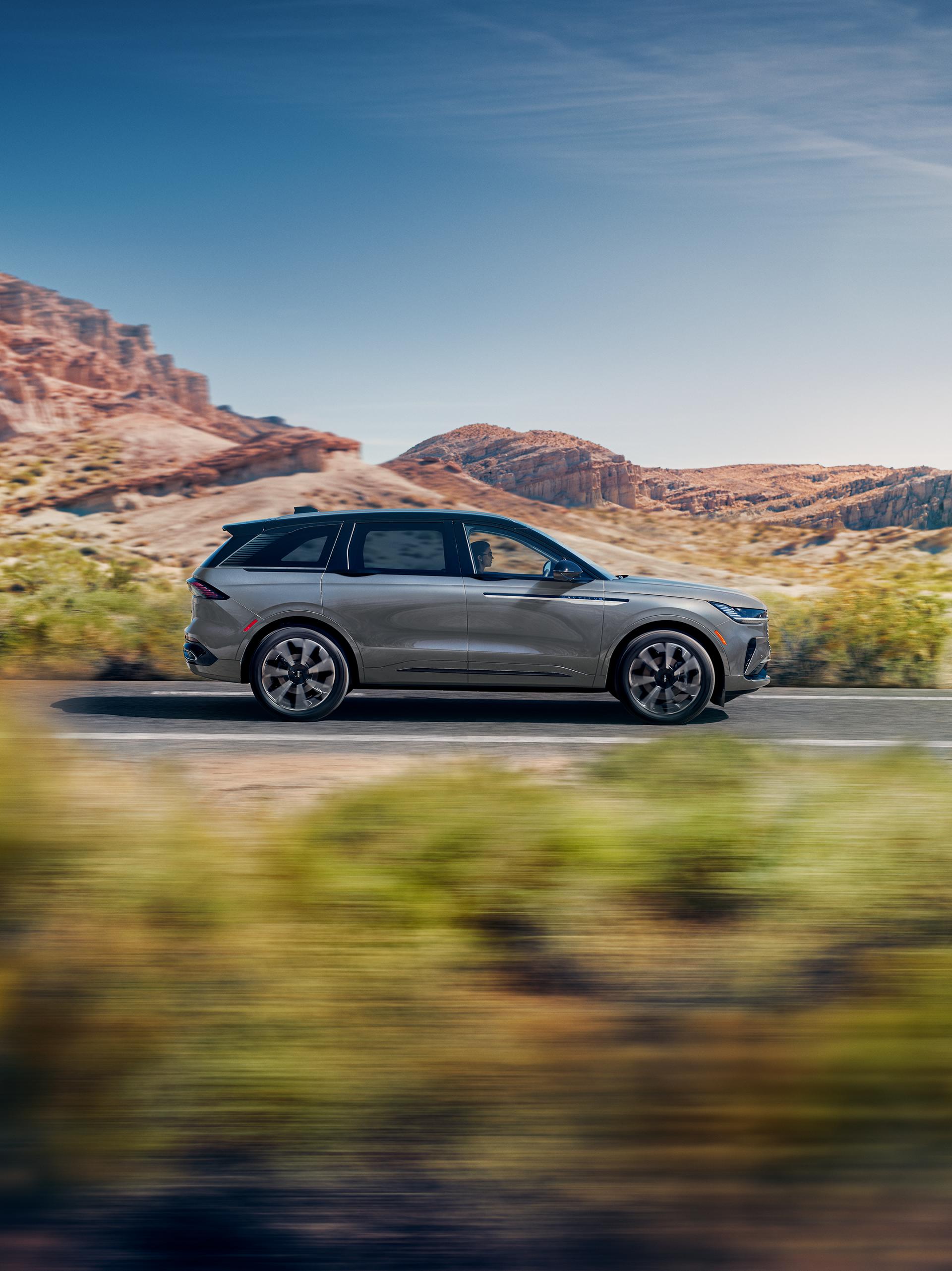 A 2026 Lincoln Nautilus® SUV is being driven on a desert highway