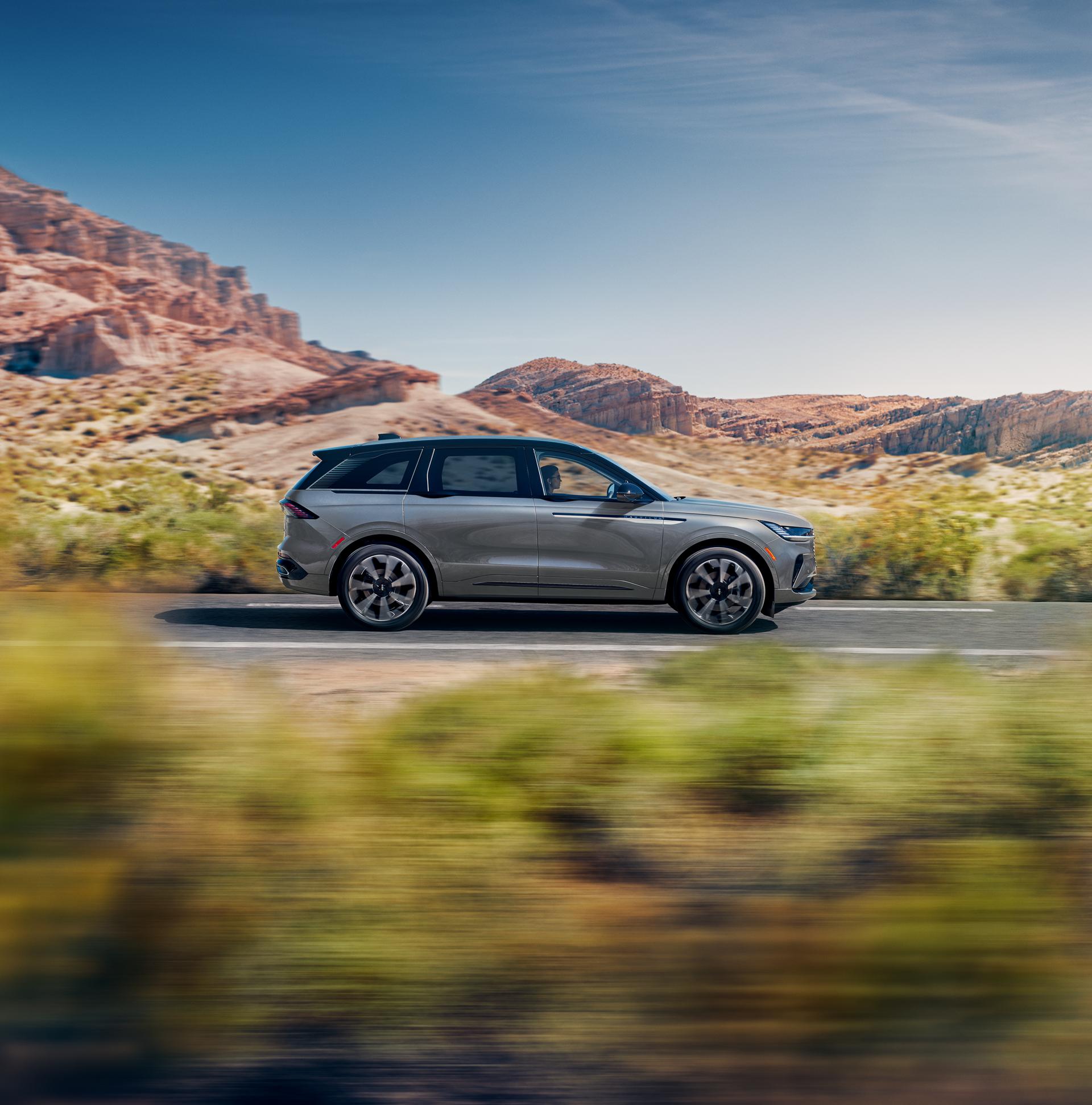 A 2026 Lincoln Nautilus® SUV is being driven on a desert highway
