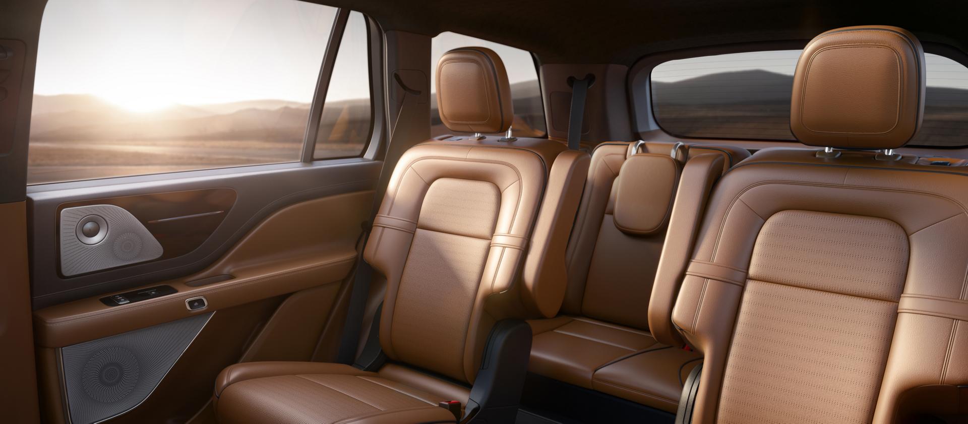 Captain’s seats in the second row of a 2025 Lincoln Black Label Aviator® SUV are shown in the Flight interior theme