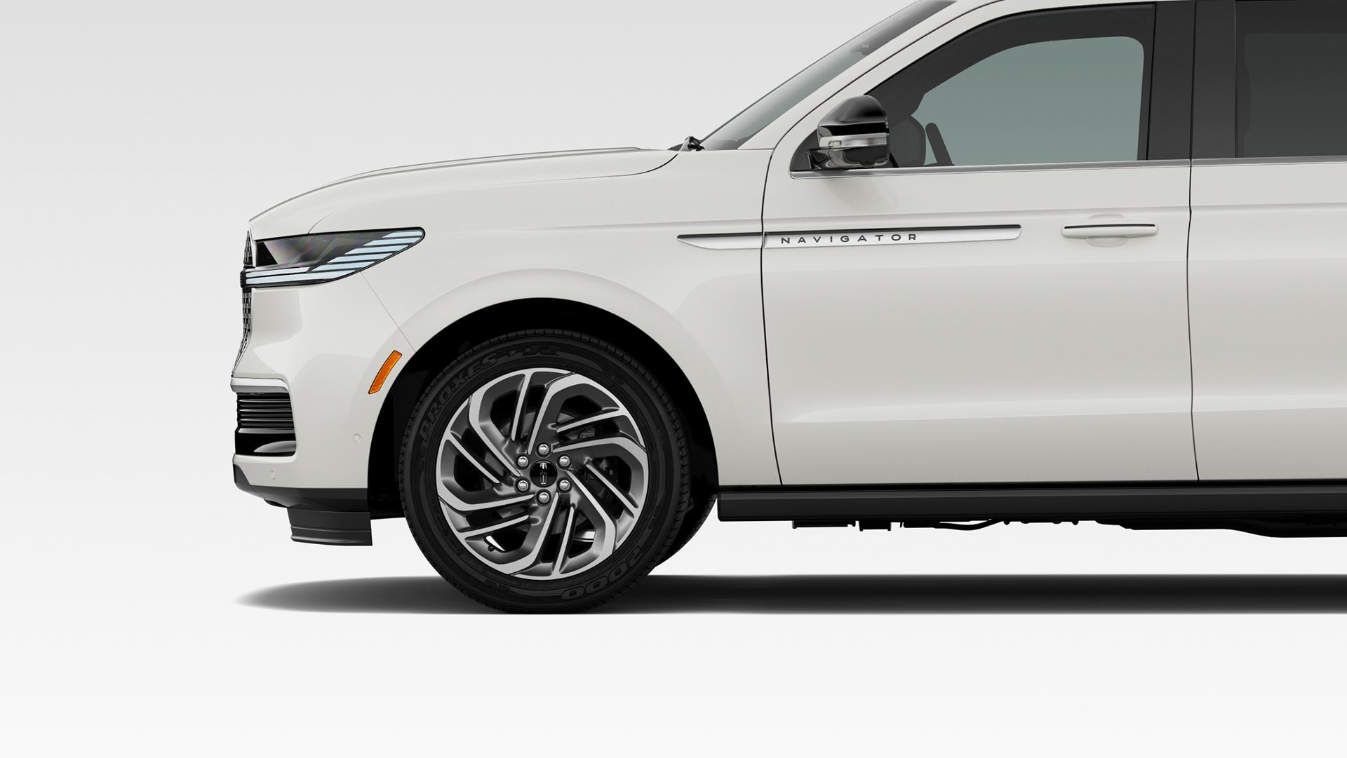 The 22-inch Dark Tarnish-painted aluminum wheels with bright-machined finish of a 2027 Lincoln Navigator® SUV