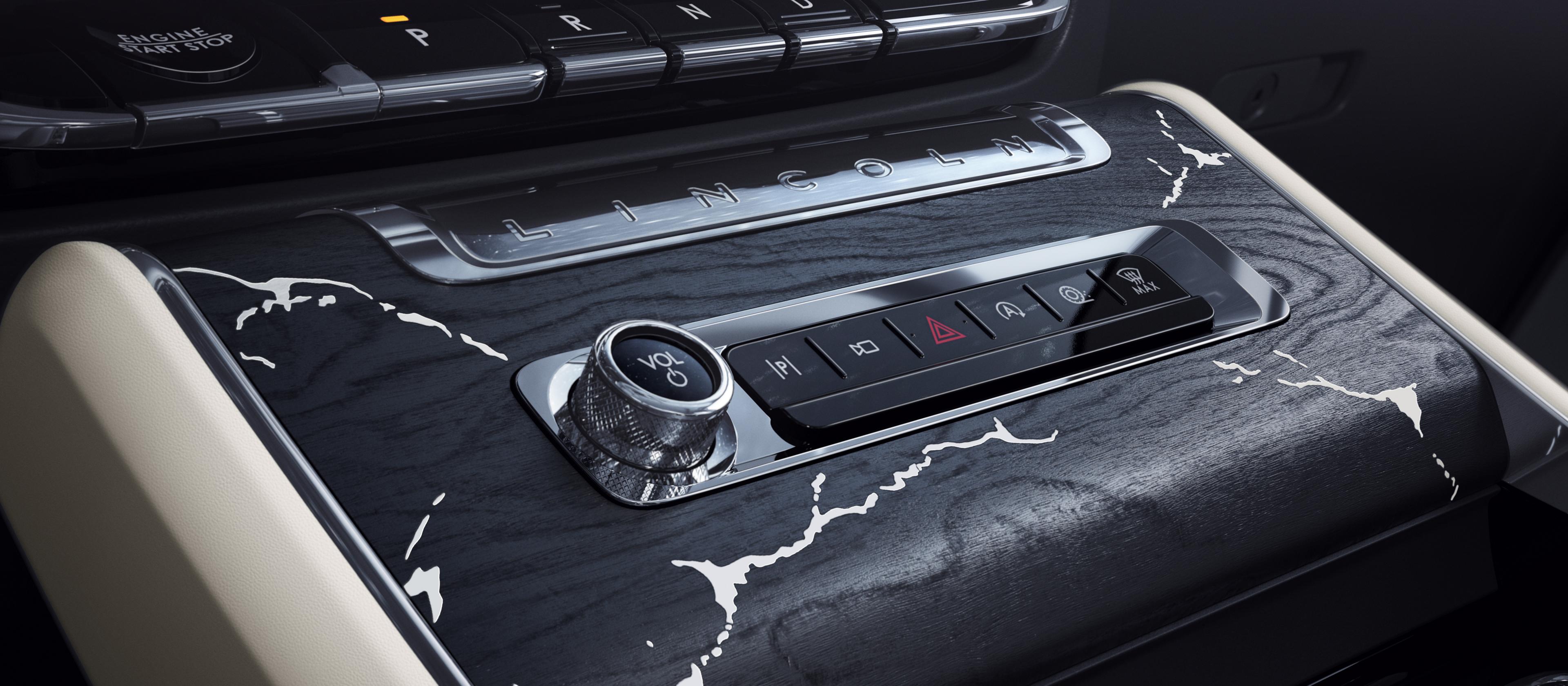 The center console of a 2026 Lincoln Black Label Aviator® SUV with marble-like applique