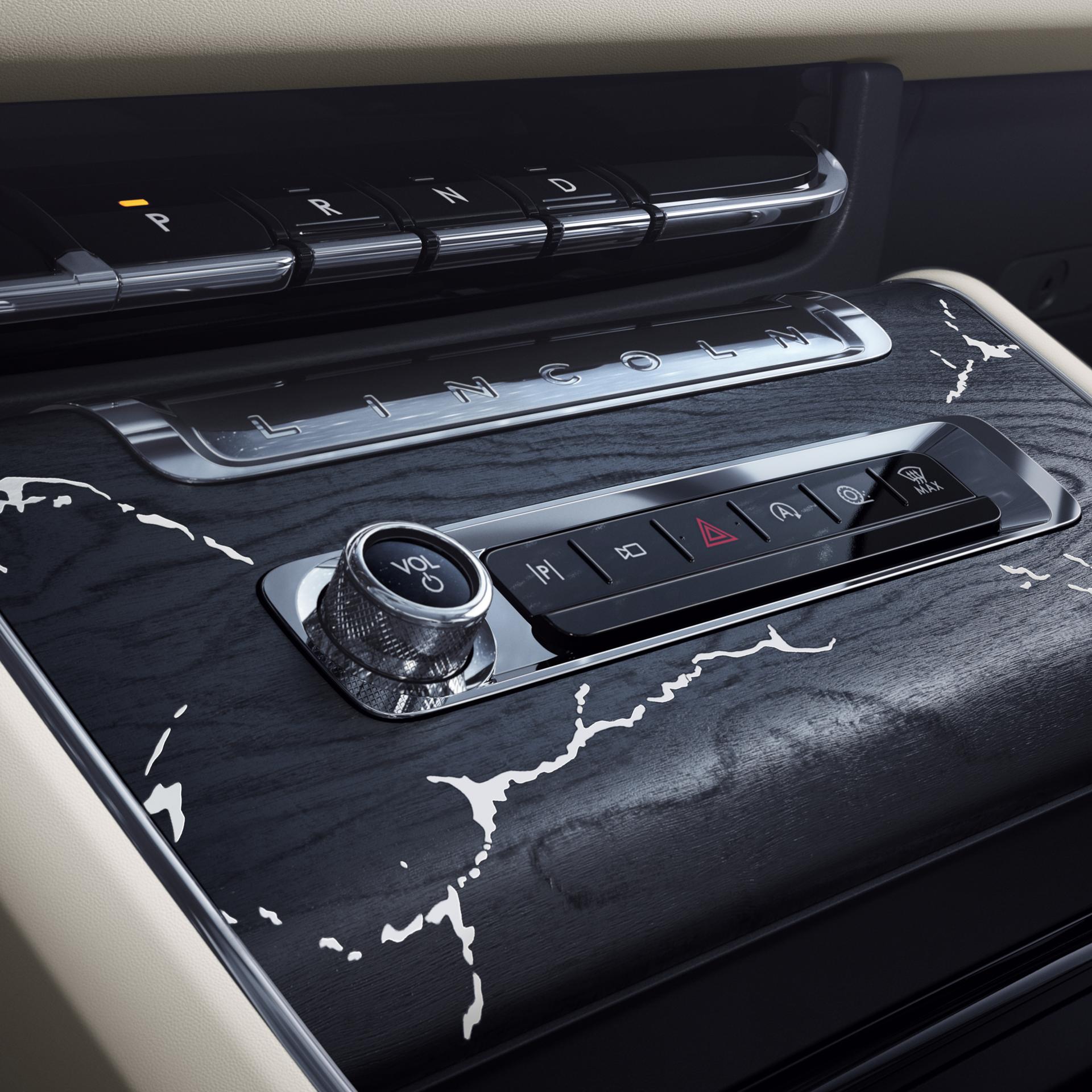 The center console of a 2026 Lincoln Black Label Aviator® SUV with marble-like applique