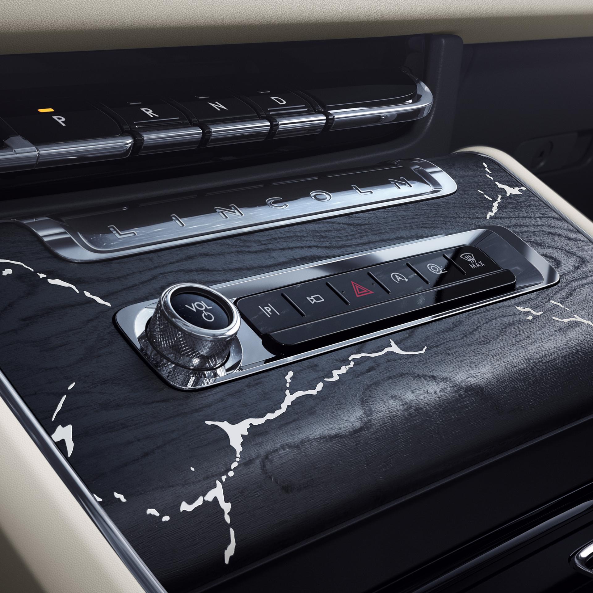 The black and white swirled Moon Ash appliqué of the Lincoln Black Label™ Moonbeam interior theme