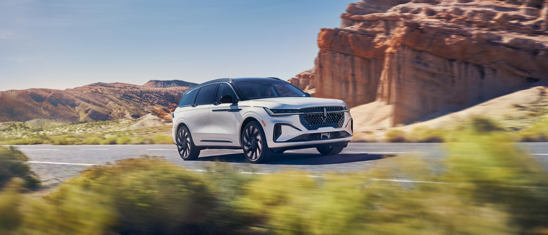 A 2026 Lincoln Nautilus® SUV is being driven on a desert highway