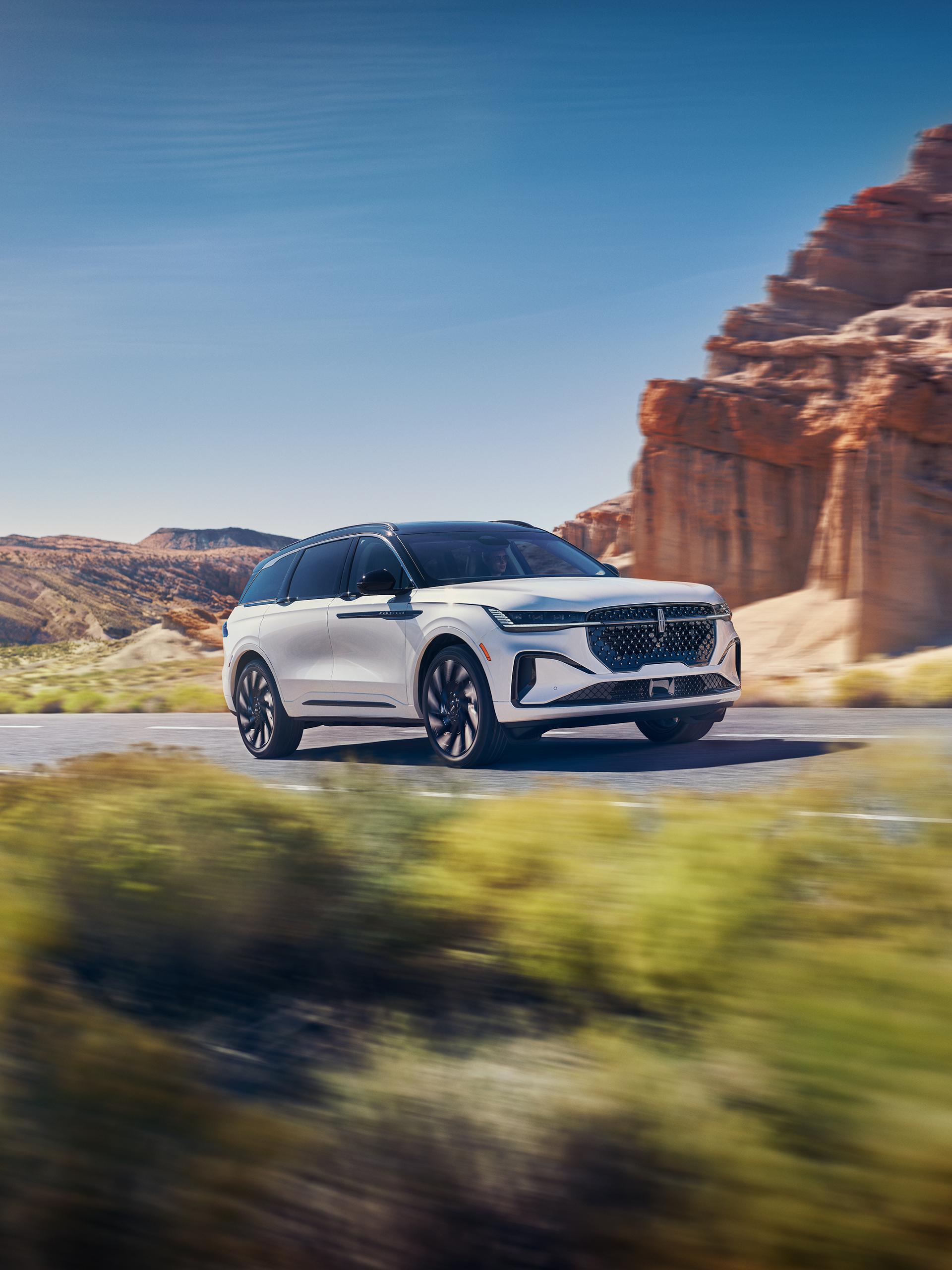 A 2026 Lincoln Nautilus® SUV is being driven on a desert highway