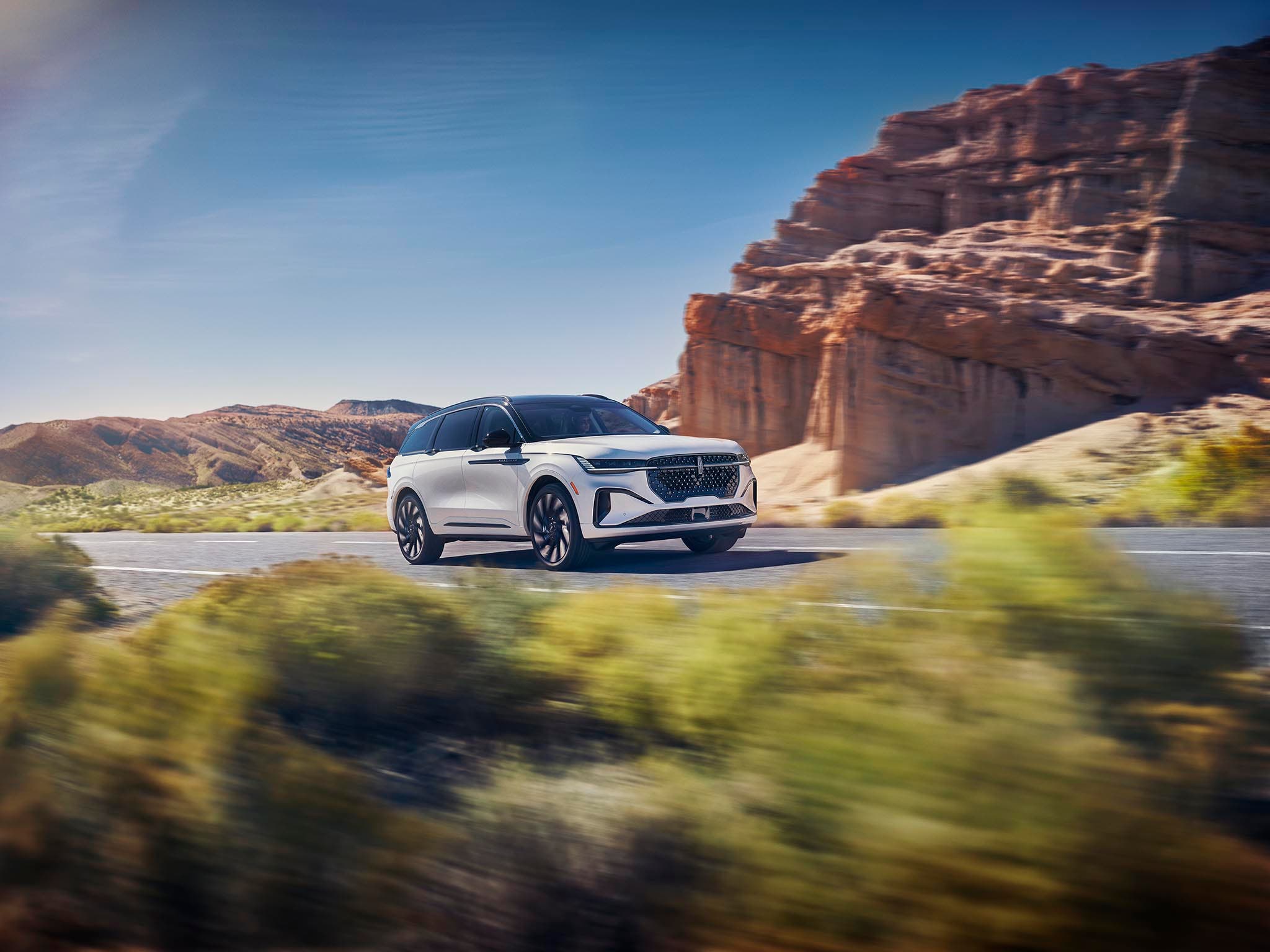 Lincoln Nautilus exterior driving on a suburban road