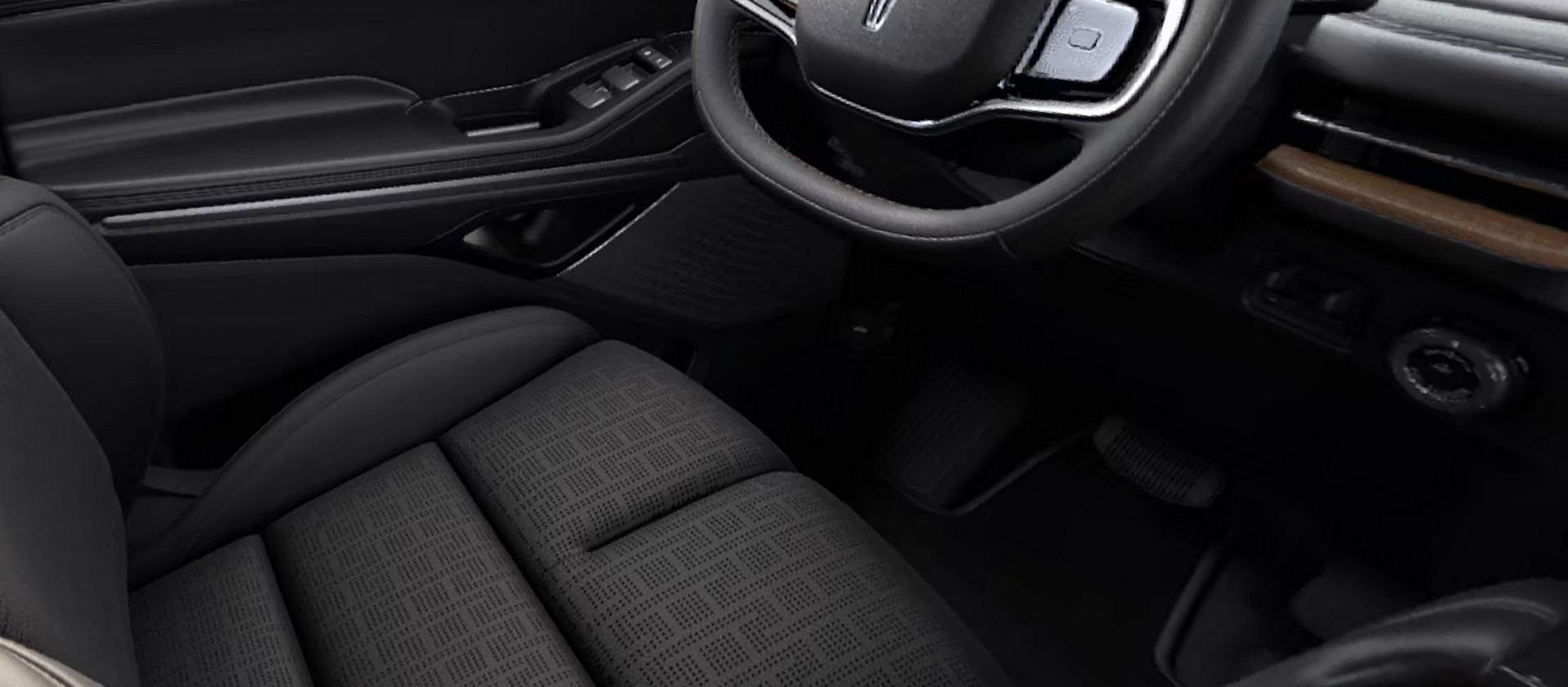 A repeating pattern in the leather seating surface of the Invitation theme represents a pergola