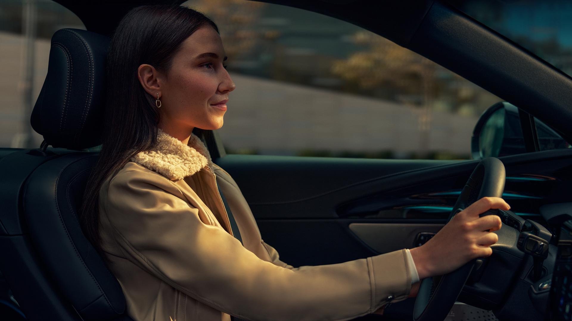 A woman is driving a 2026 Lincoln Nautilus® SUV