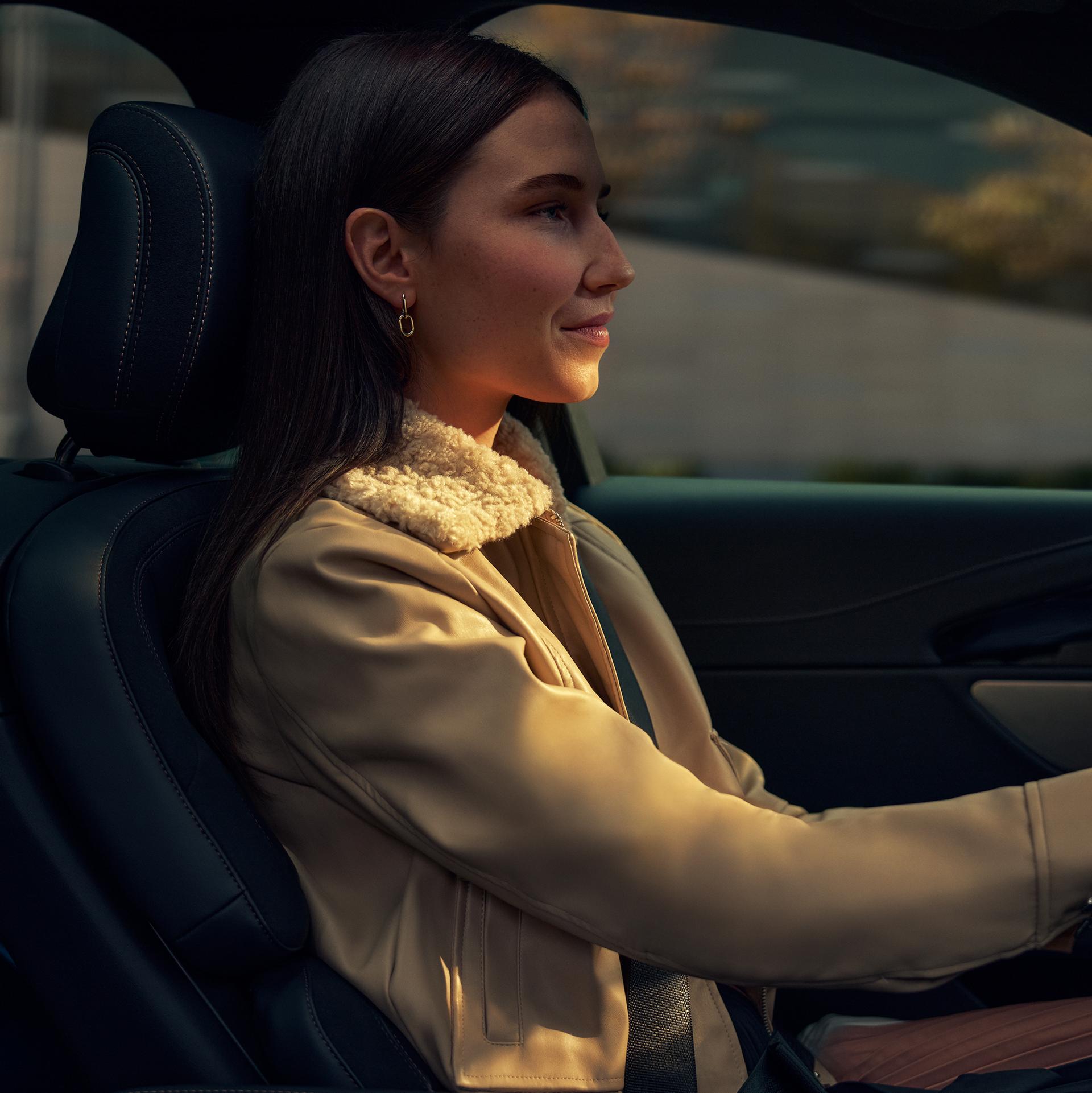 A person is seated in the driver's seat of a 2026 Lincoln Nautilus® SUV