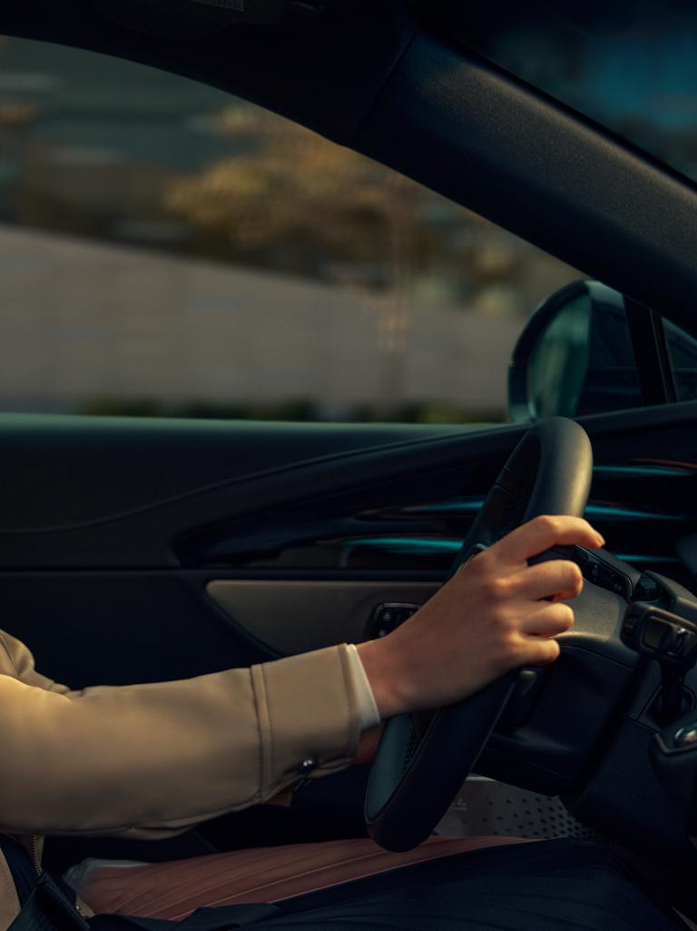 A person is seated in the driver's seat of a 2026 Lincoln Nautilus® SUV