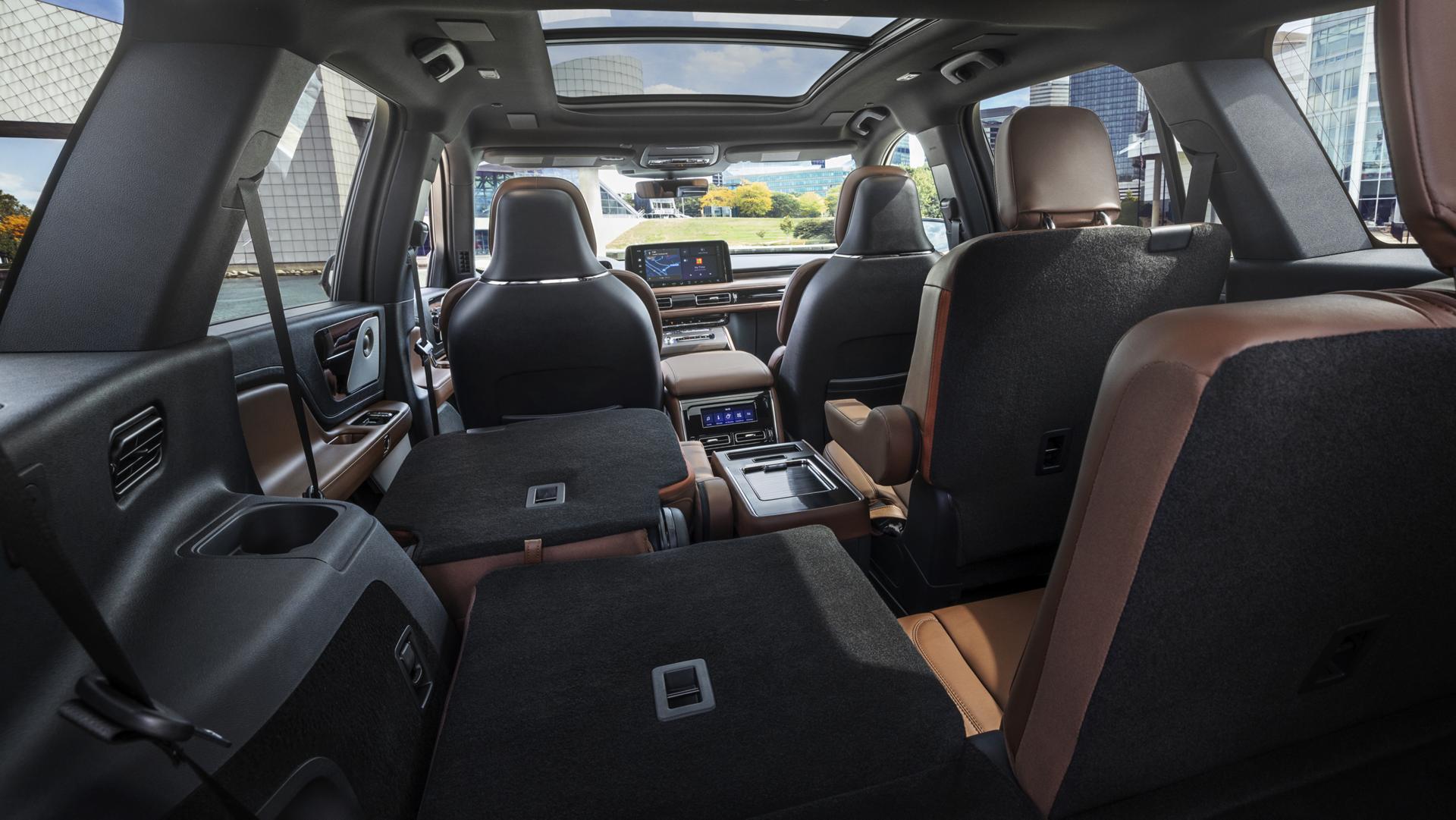 One side of the PowerFold® third-row seat and a second-row seat are folded forward in the 2026 Lincoln Aviator® SUV