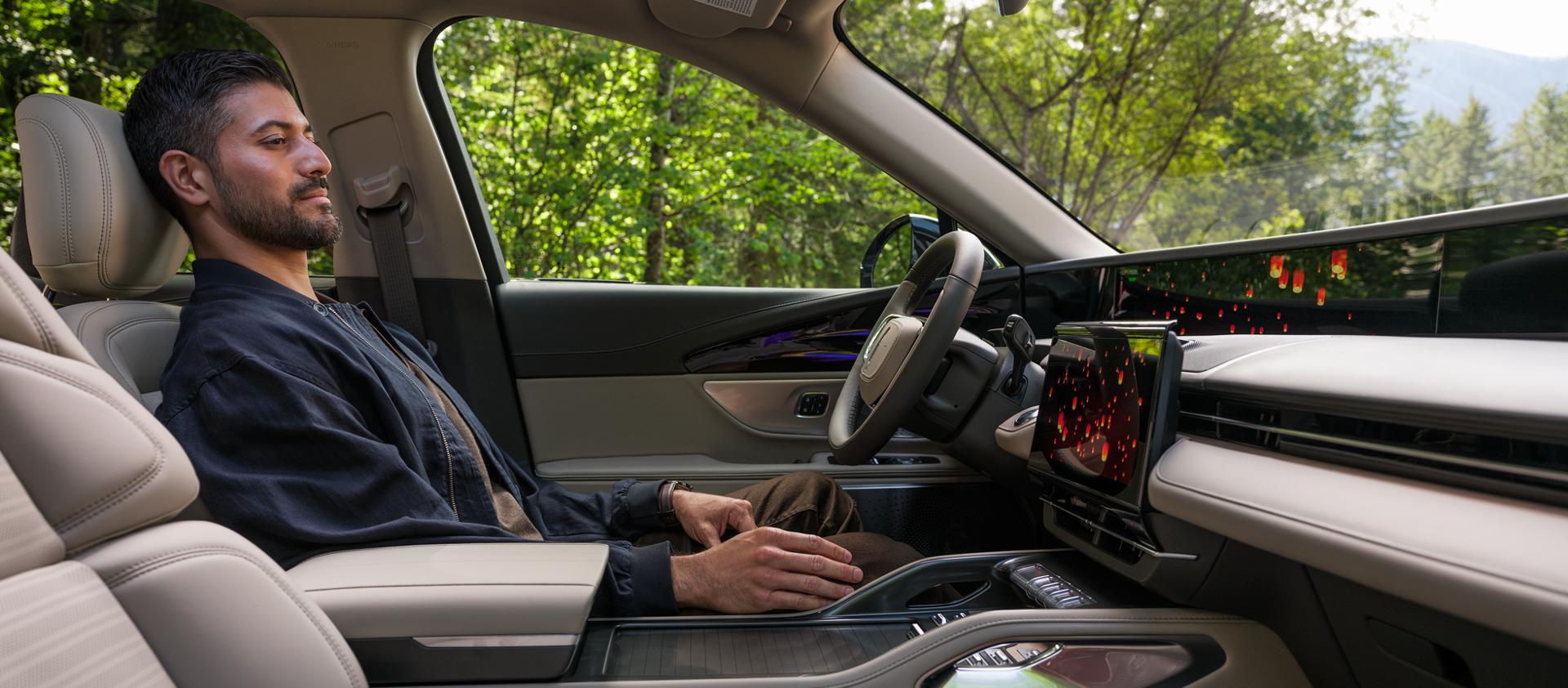 A man enjoys a moment to recharge with the Lincoln Rejuvenate experience