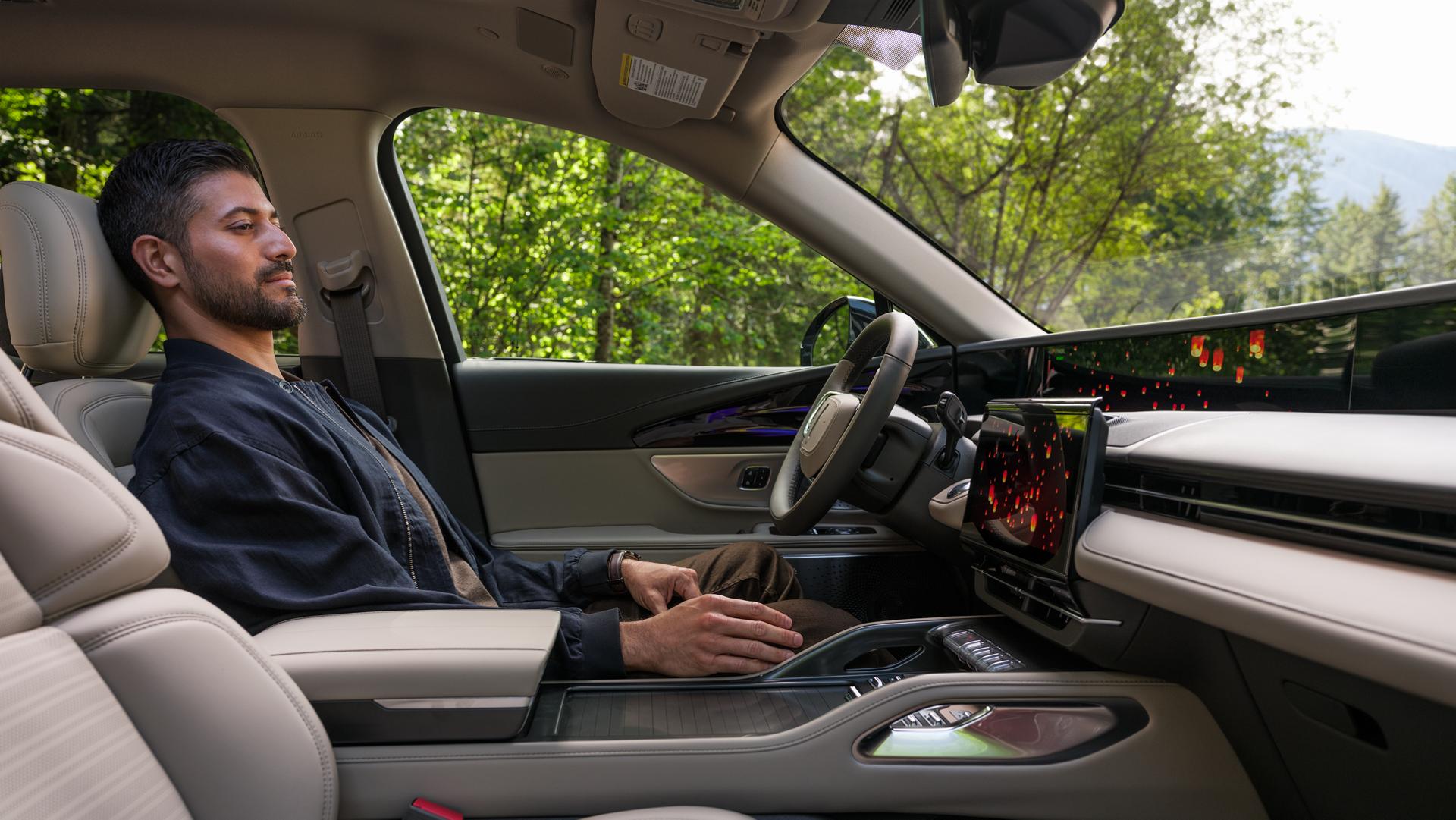 A man enjoys a moment to recharge with the Lincoln Rejuvenate experience
