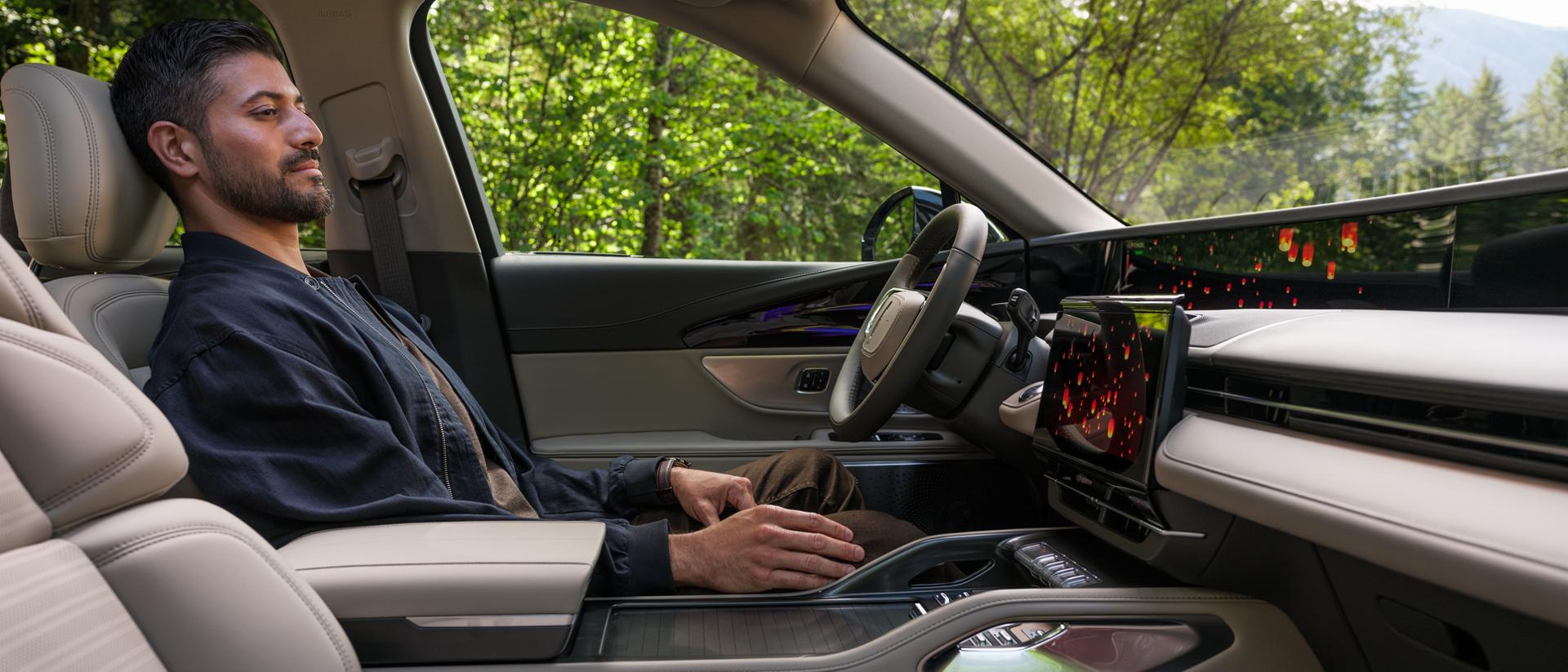 A man enjoys a moment to recharge with the Lincoln Rejuvenate experience